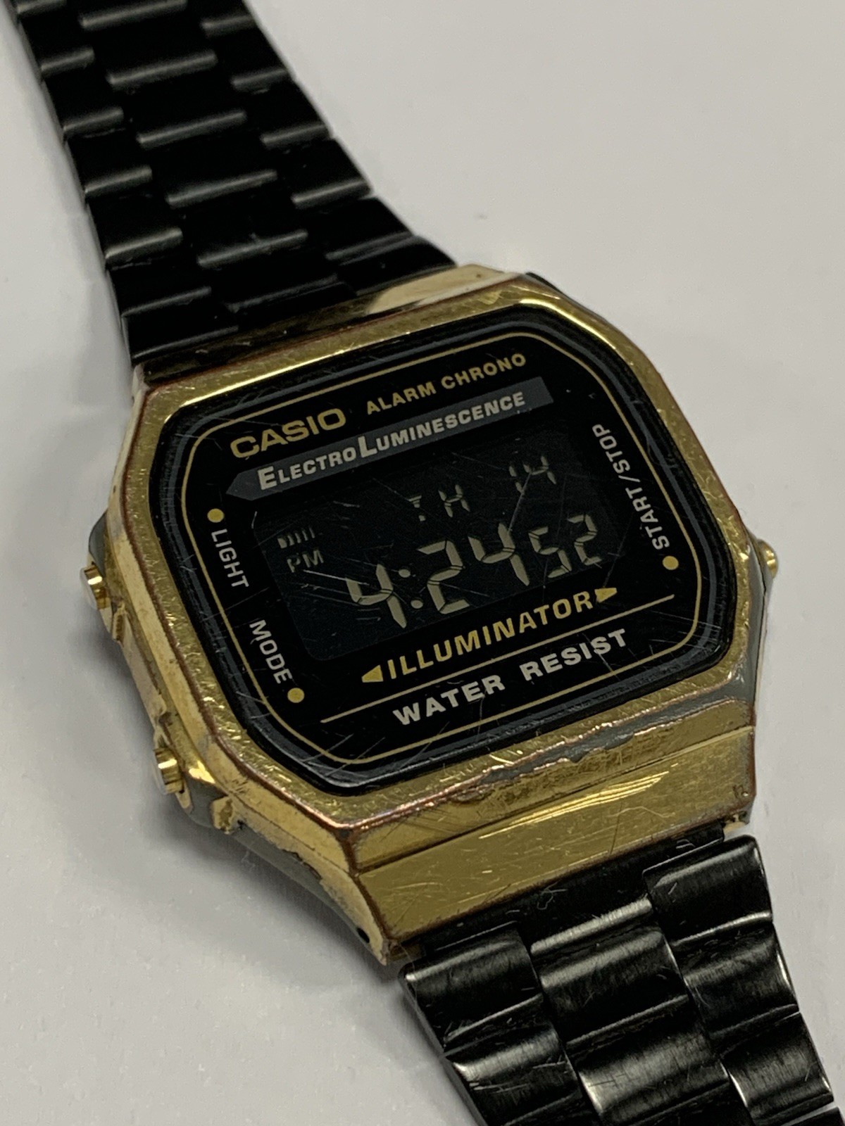 Vintage Casio A168WE Black Gold Tn Digital Watch Illuminator Alarm Chrono Works