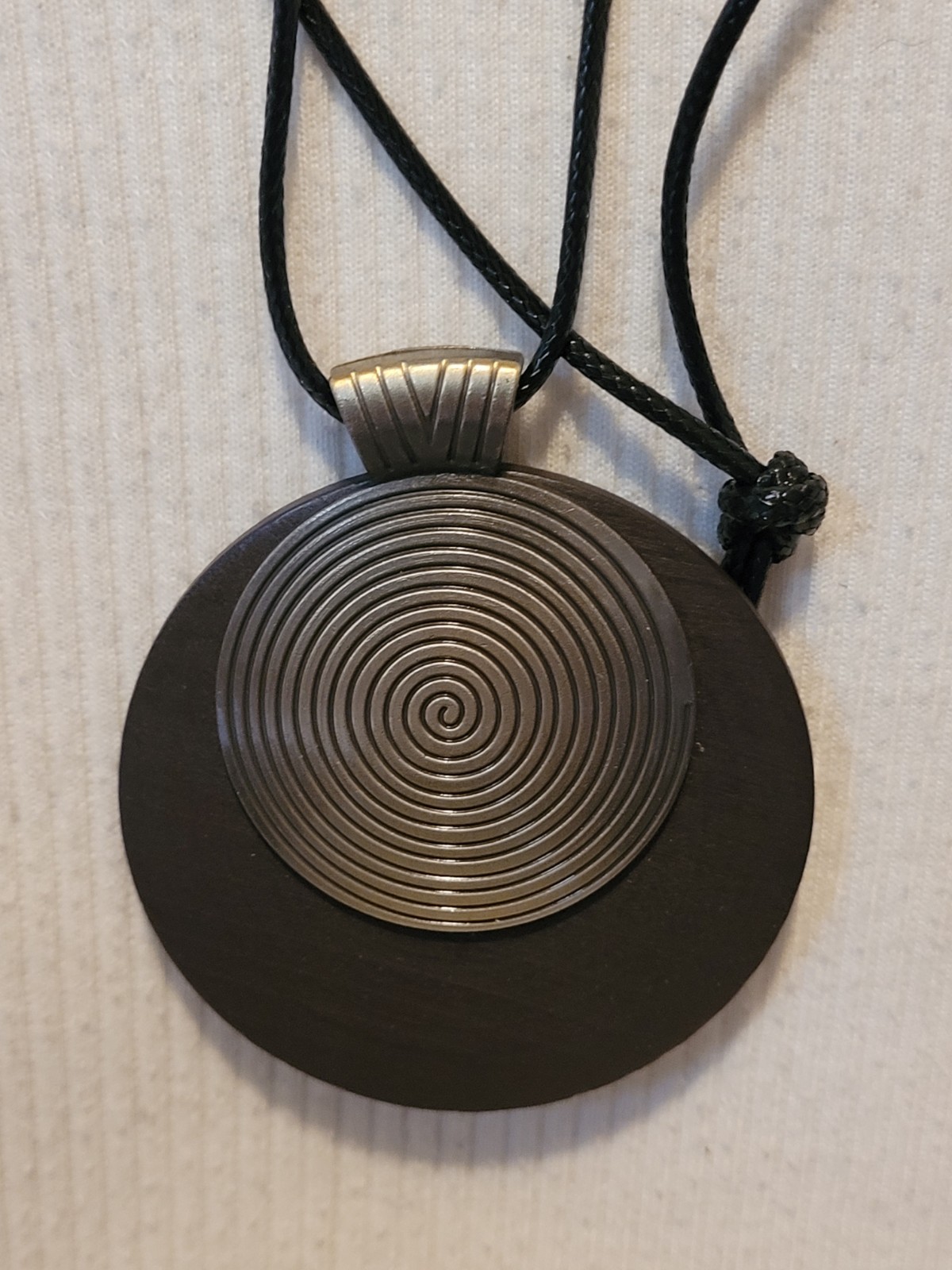 New Large Round Wooden And Metal Spiral Pendant On A Black Cord Type Chain