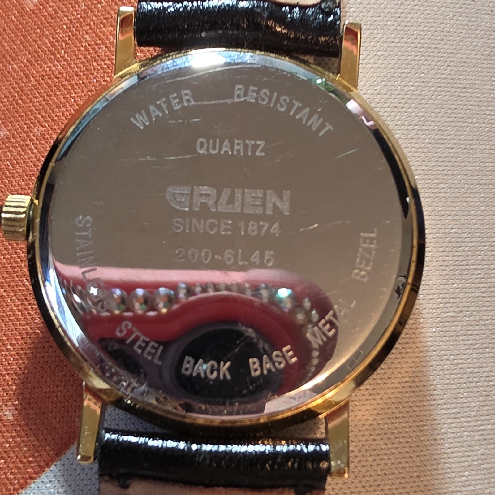 Gruen Classic Quartz Gold Tone Stainless Case White Roman Dial Black Leather