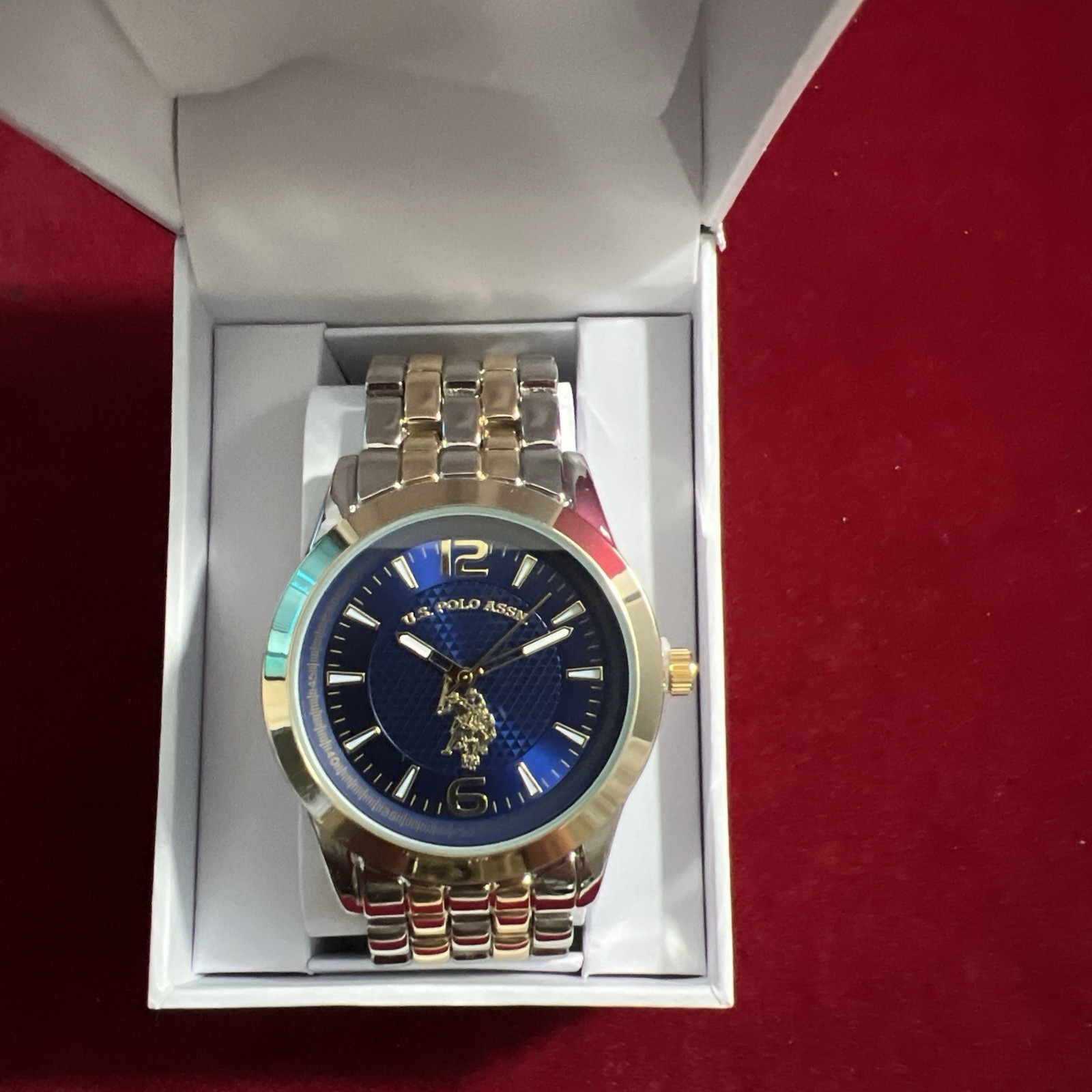 U.S. Polo Assn. Men’s Analog Bracelet Watch Blue Dial with Gold-Tone Bezel
