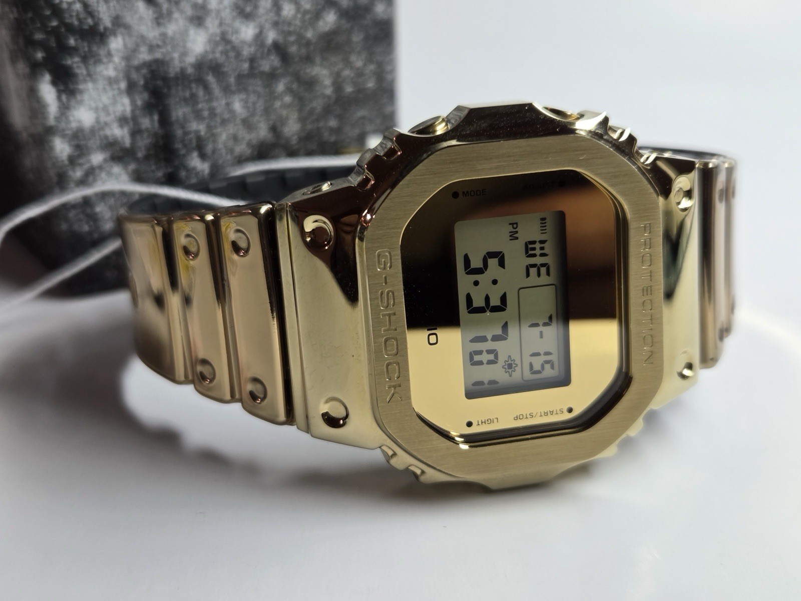 Casio G-Shock GM-5600YMG-9 Gold Metal G-Steel Digital Watch Brand New