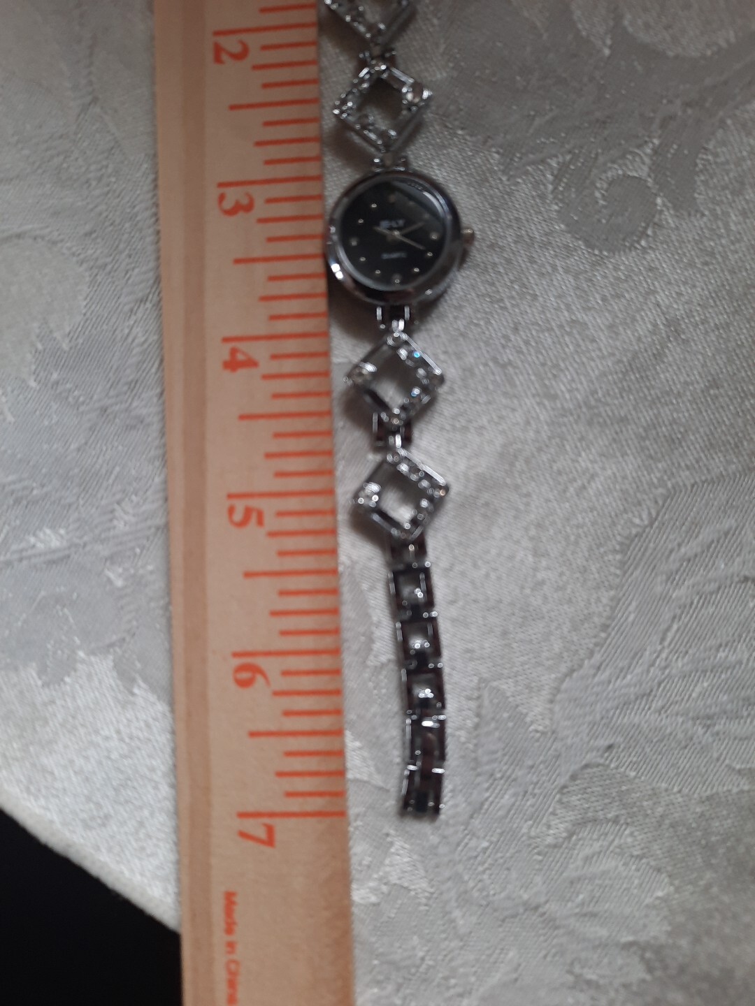 E-LY elegant , silver Quartz ladies watch rhinestones new battery