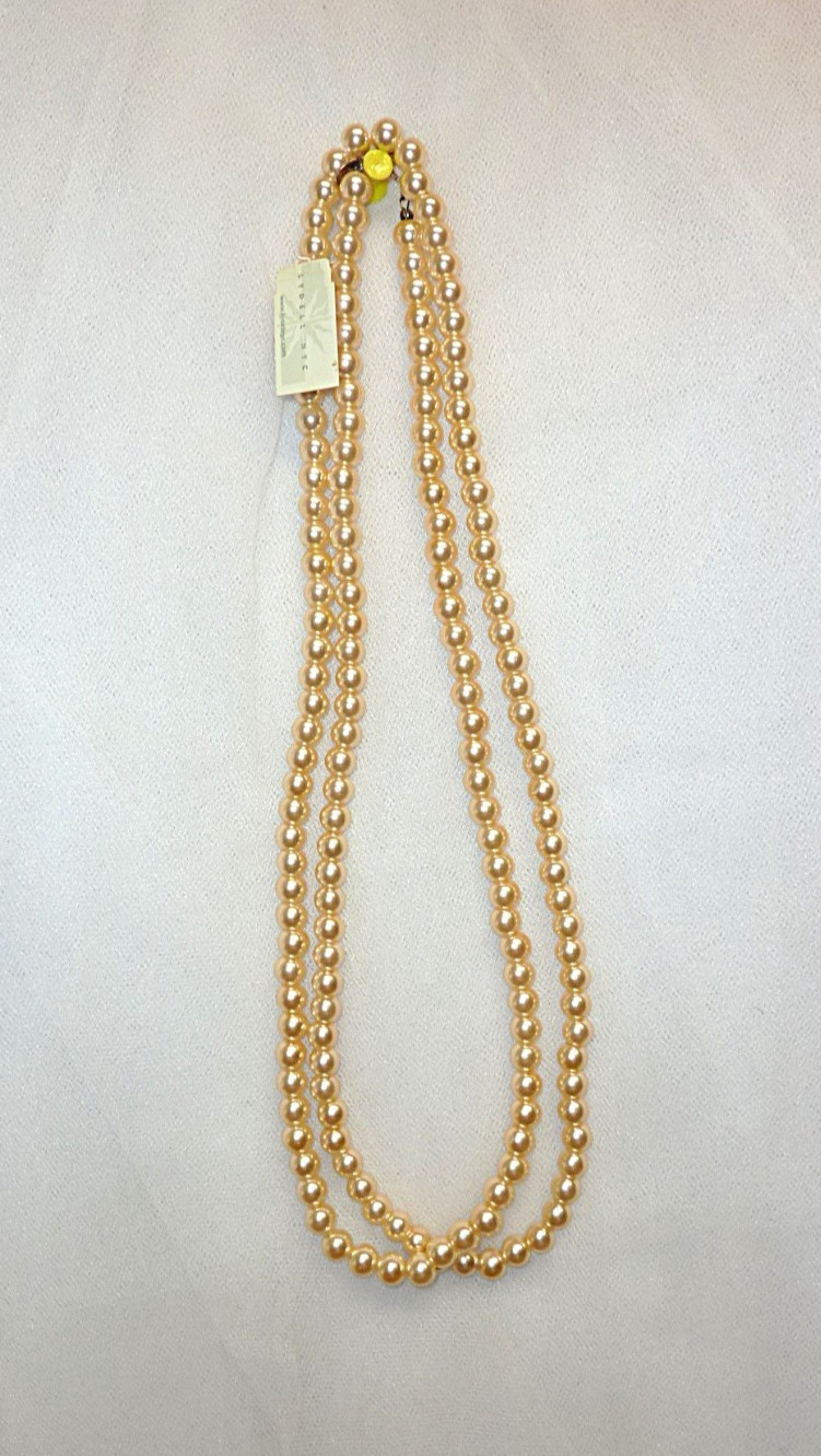 Lydell NYC 7.5 inch Ivory Faux Pearl Necklace 46 inch long. (With label.)