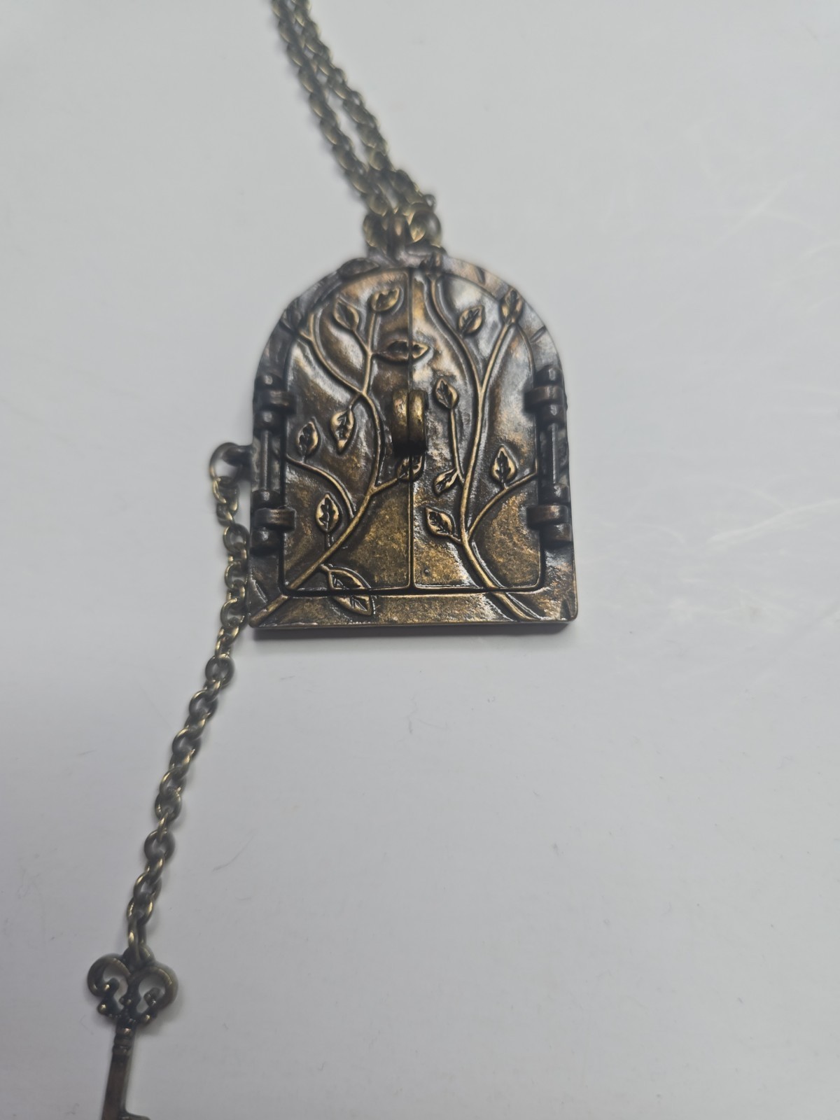 Victoria Trading Company Fairy Door Locket Antiqued Brass Tone With Skeleton Key