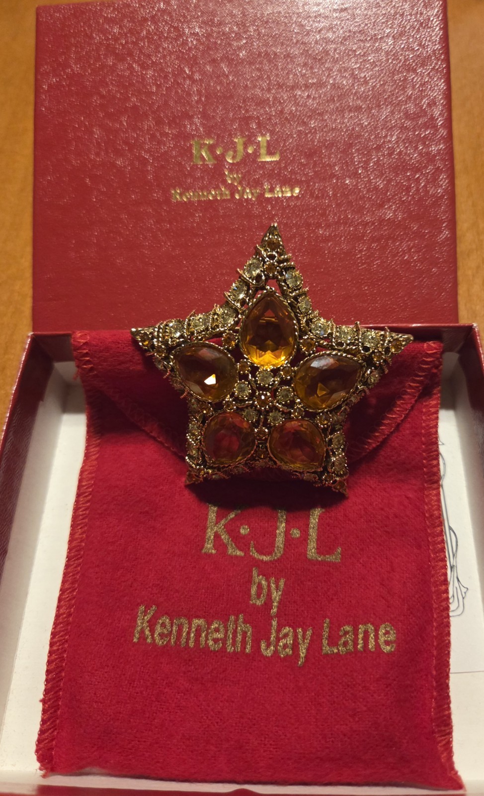 Kenneth Jay Lane KJL Signed Star Brooch Pin Gold Tone Amber Rhinestone Cluster