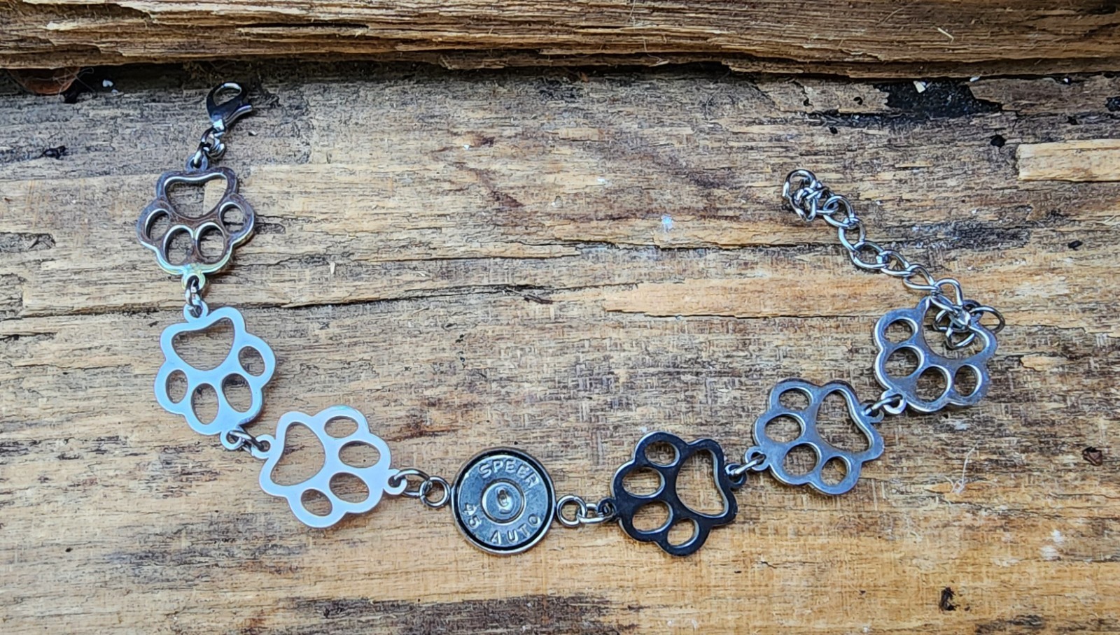Bullet Bracelet, Stainless Steel Puppy Paws and 45 Auto. Optional Glass Crystal.