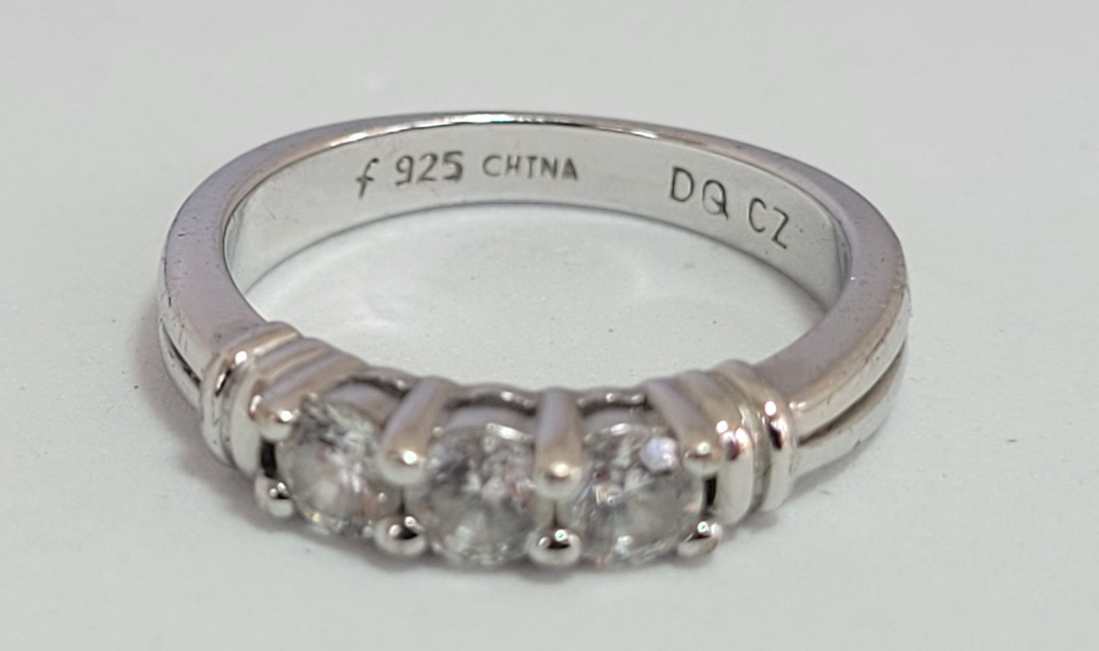 “DQ” Diamonique – Sterling Silver 3-stone CZ ring