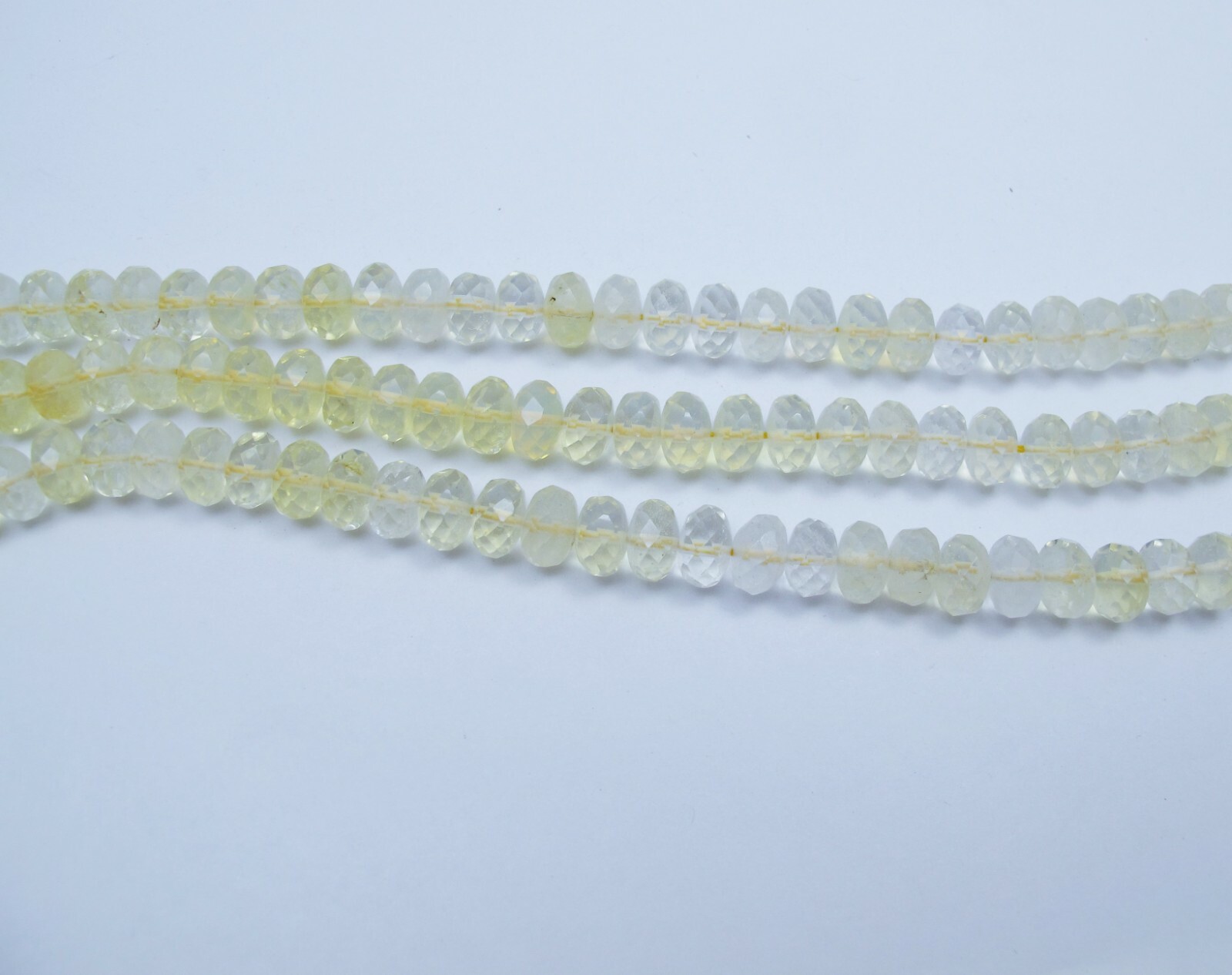 Pineapple quartz faceted roundell beads. 8mm,10mm Light yellow quartz beads.