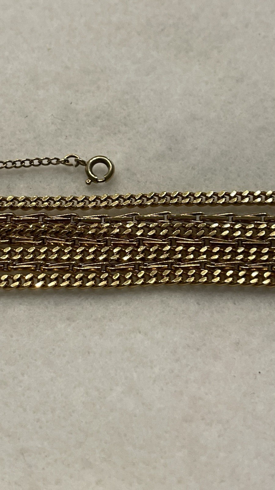 Vintage Monet 7” Gold 7 Strand Braclet With Safety Chain