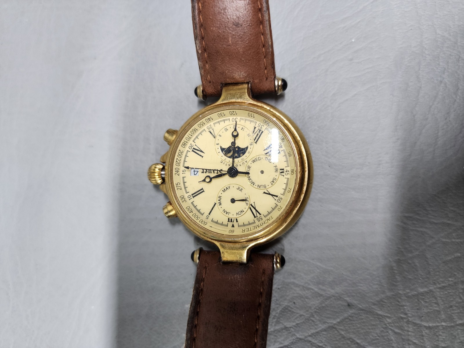 (Needs New Battery) – Stauer Wristwatch Leather Tachymeter Moon Phase Beige Dial