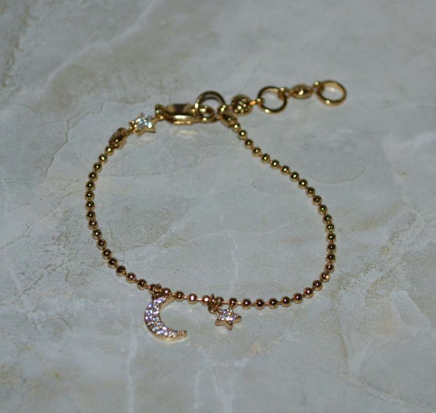 Henri Bendel Chain Bracelet with Star and Moon Charm