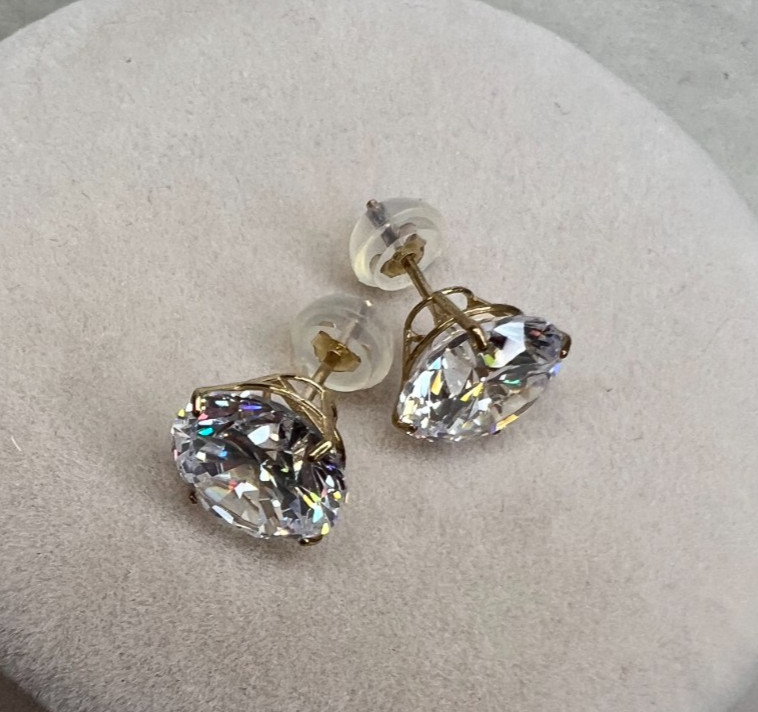 Bella Luce Cubic Zirconia 9.00ctw round 10K yellow gold stud earrings