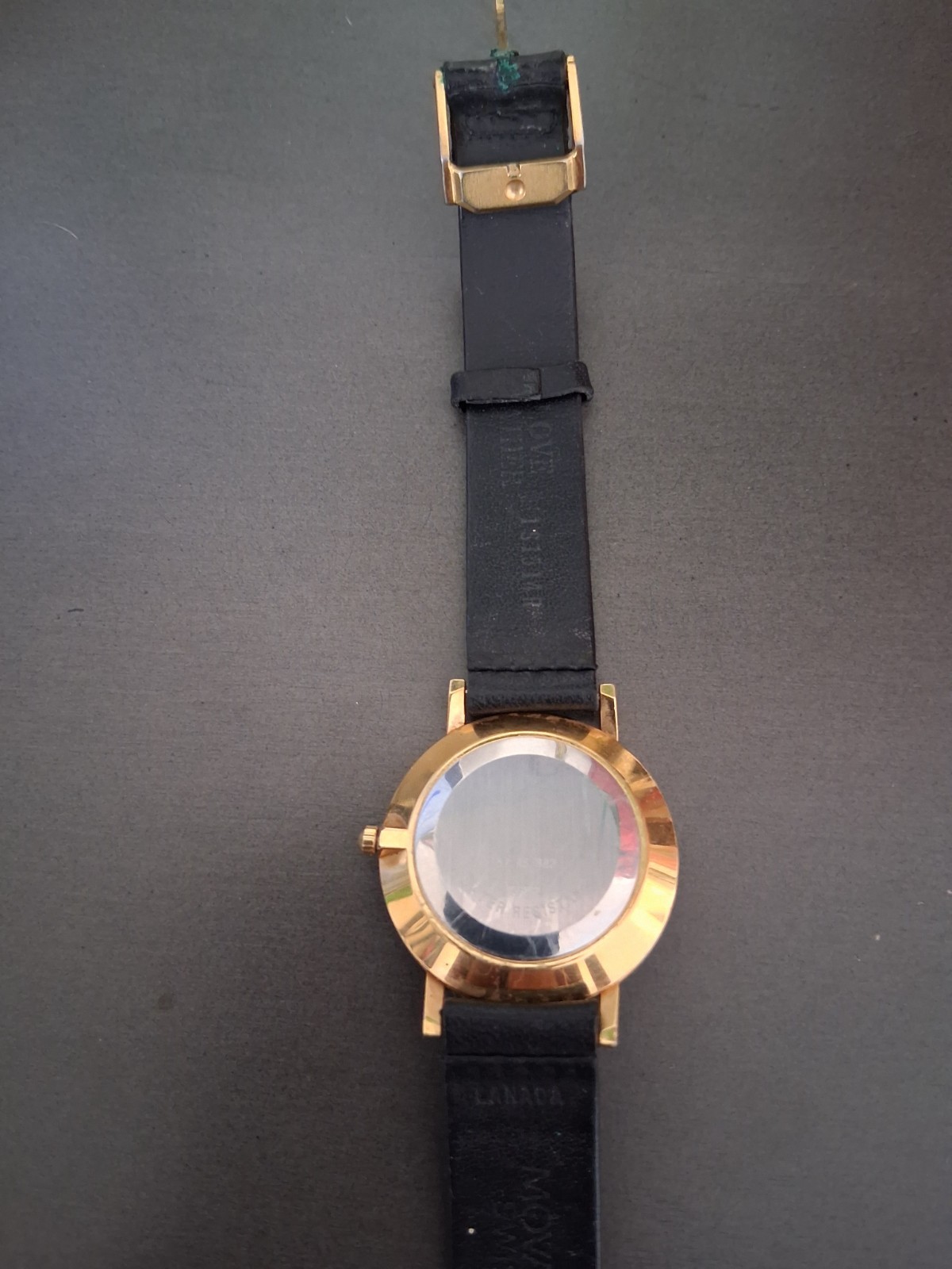 Movado Museum Wrist Watch for Men, gold face, black leather band, NEW Battery