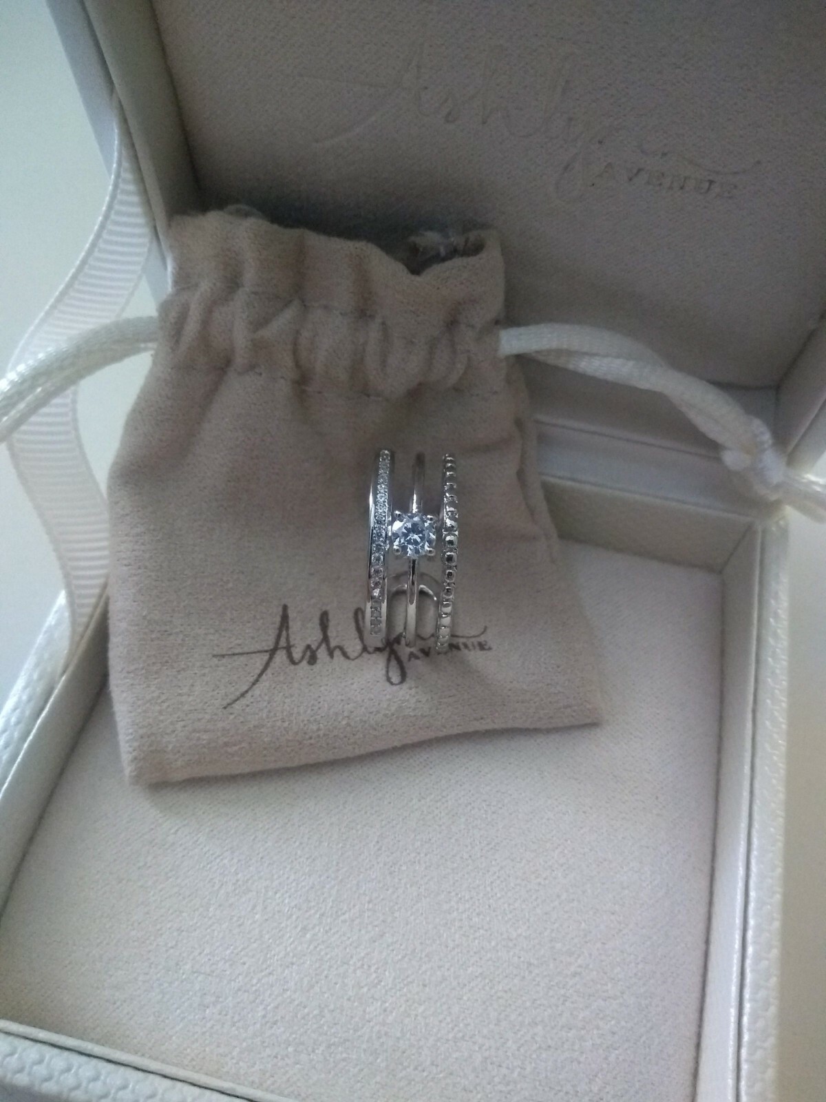 Ashlynn Avenue Aurora White Gold Trio Wrap Ring with Center Stone Size 6
