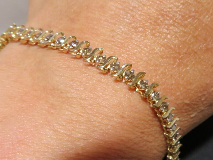 10K LADIES DIAMOND TENNIS BRACELET 1.00 tcw 7″ LONG 4.49 MM WIDE 6.42g(6132597-9