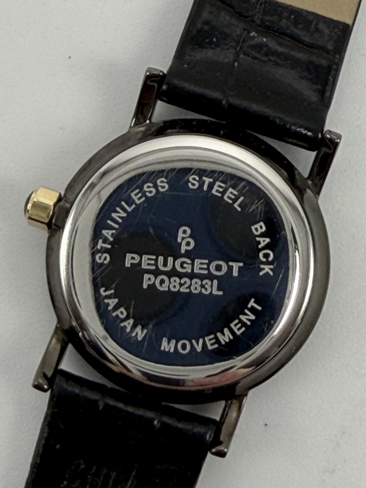 Peugeot PQ8283L New Battery Ladies Watch 24MM 6.5″ Black Leather Band