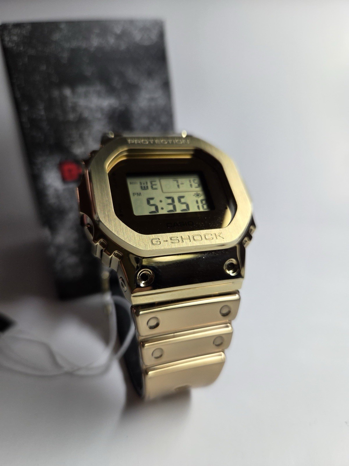 Casio G-Shock GM-5600YMG-9 Gold Metal G-Steel Digital Watch Brand New