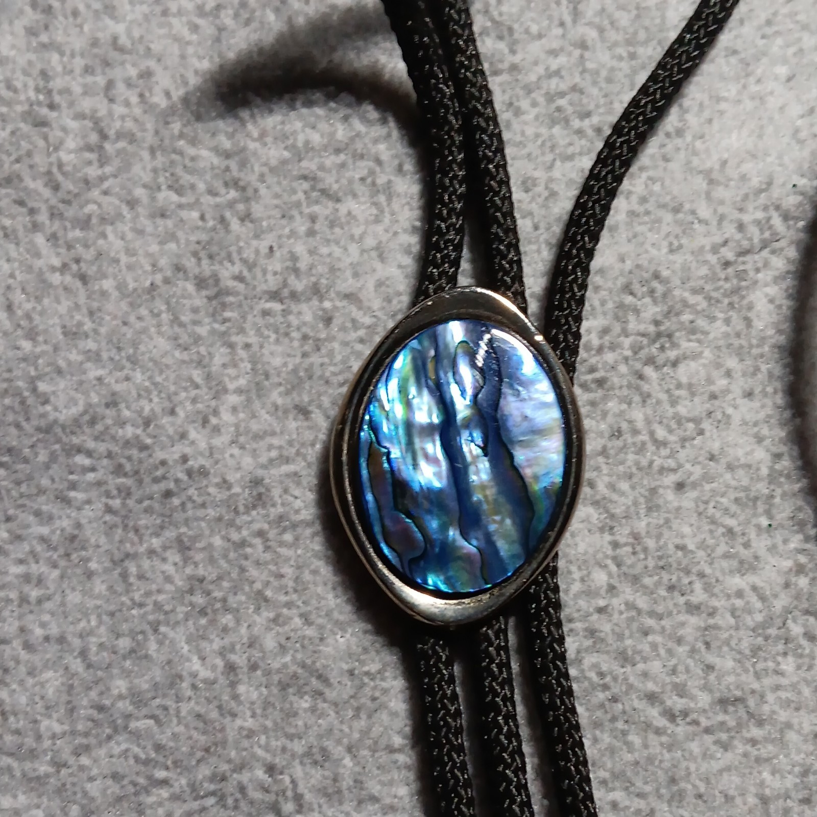 Men’s Western Bolo Tie Black Cord Oval Blue Mother of Pearl/Abalone Slide