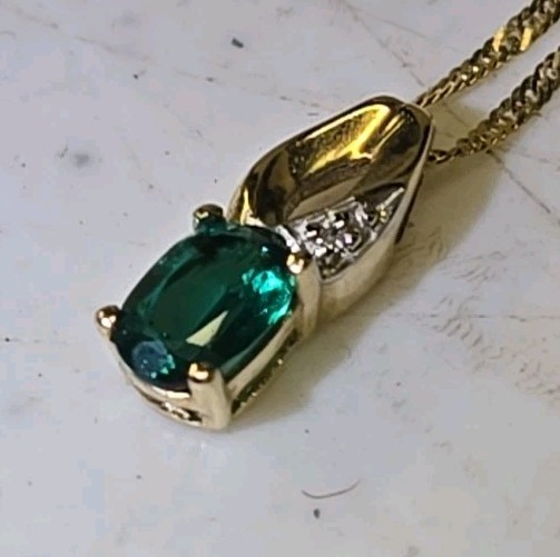 10k Yellow Gold 20″ Neckalce With 10k Emerald And Diamond Accent Pendant