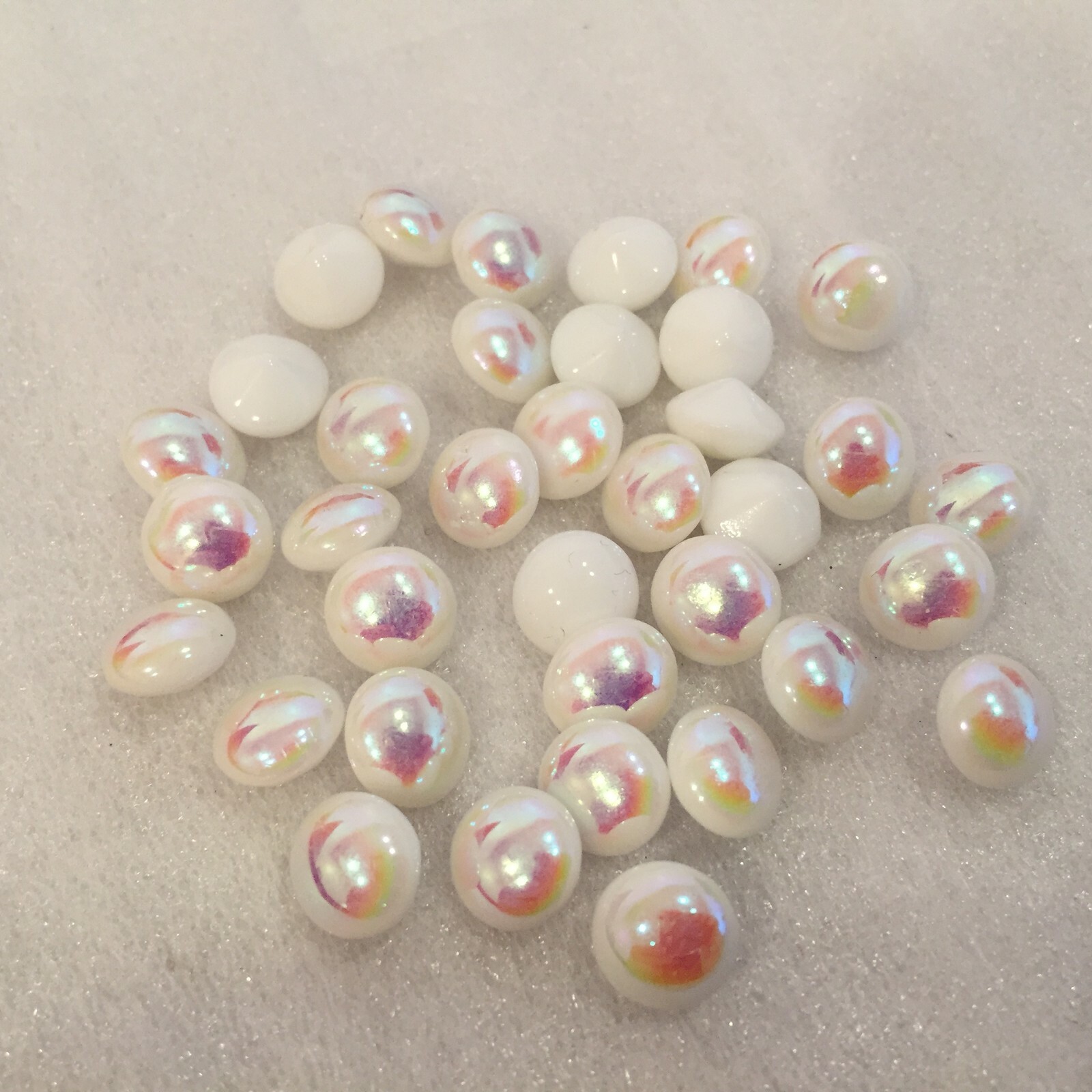 AM1012 SS39 (8.3mm) opaque white AB round bombe glass jewels, unfoiled (36)
