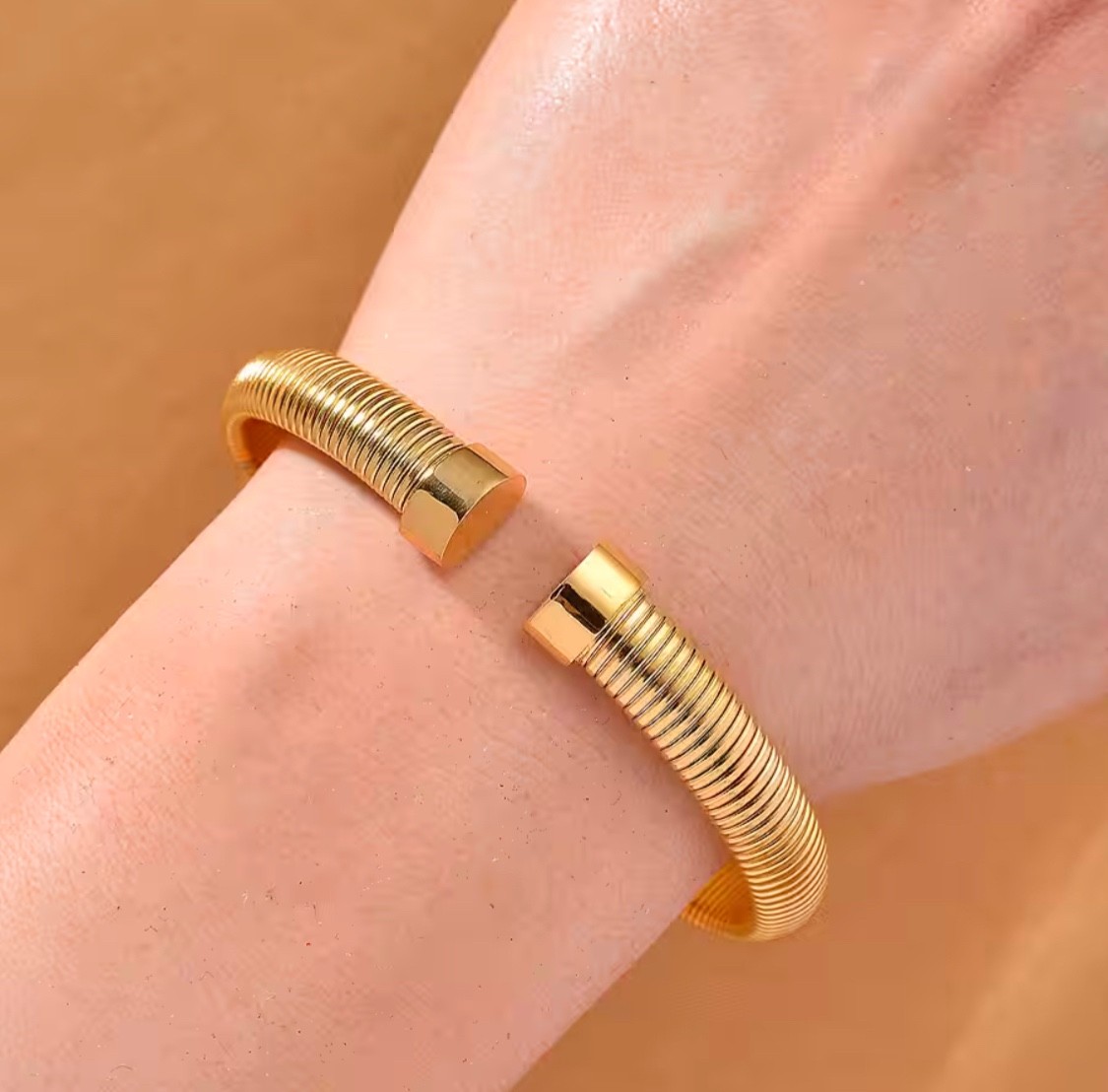 Designer Inspired Tubogas Adjustable Bangle in Gold Tone Pure Stainless Steel