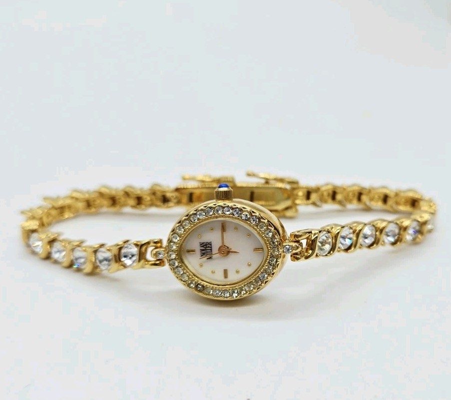 Nolan Miller Watch Tennis Bracelet Crystal Gold tone New battery Oval 7.25 in