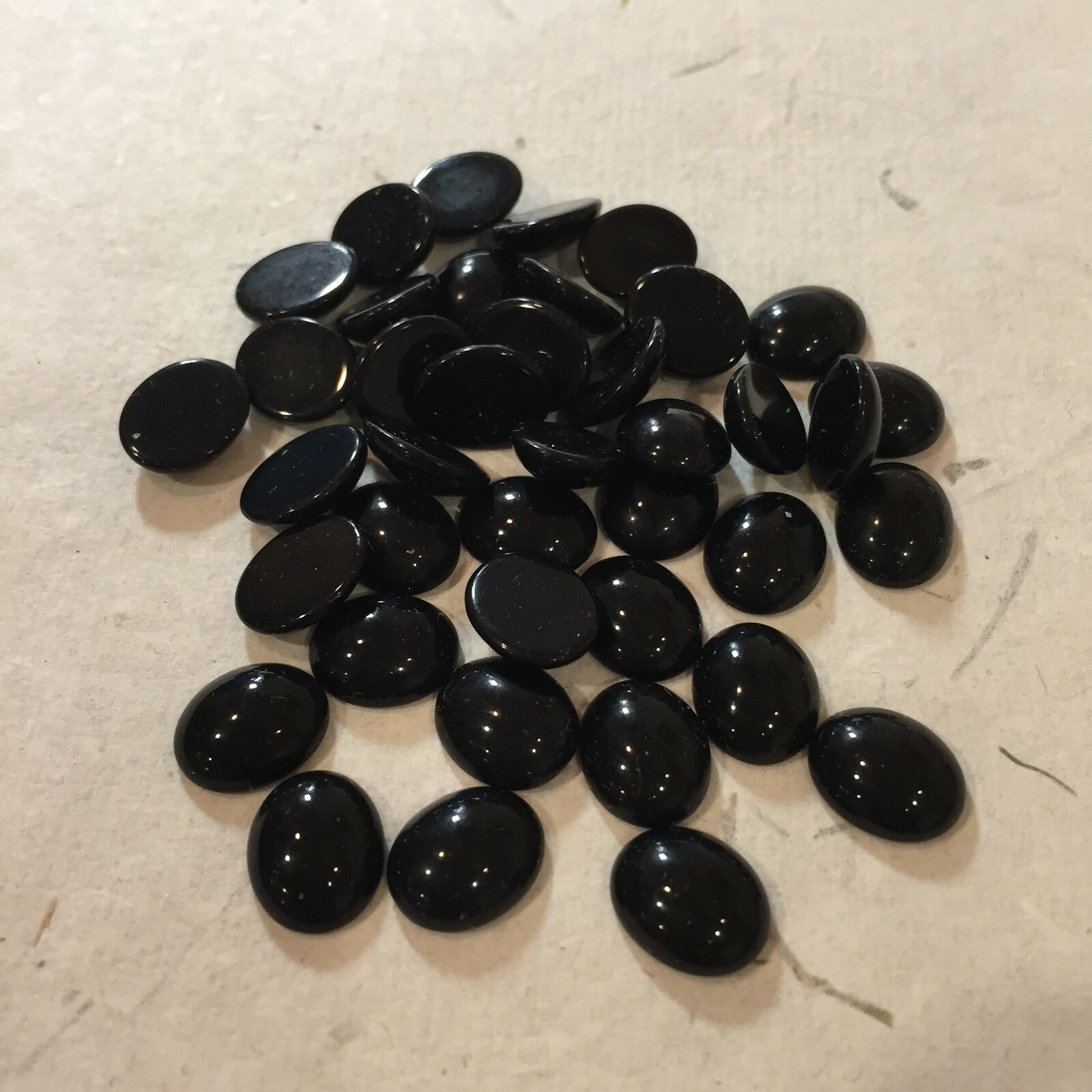 E218 12x10mm jet black opaque glass cabochons, unfoiled (36)