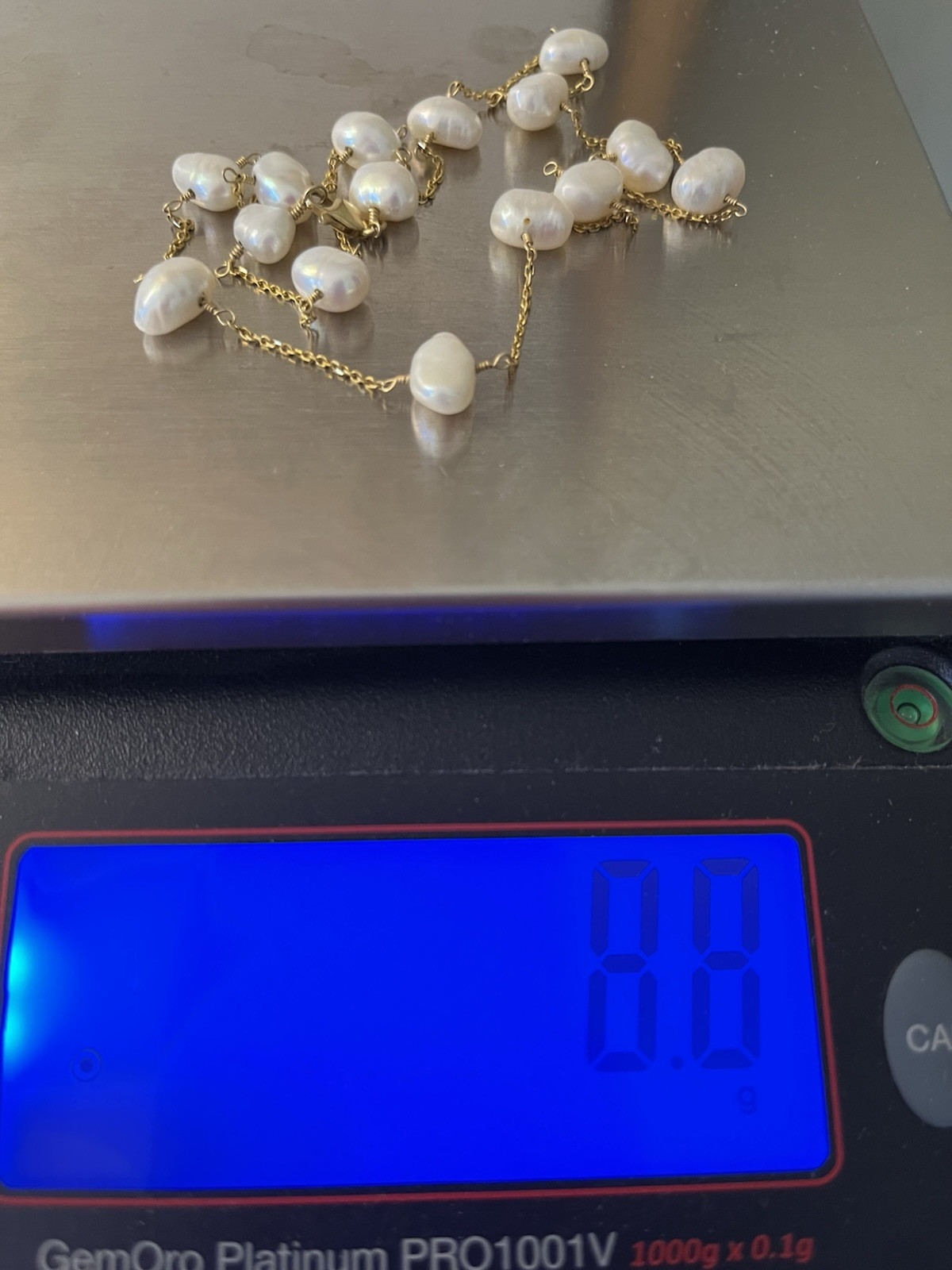 Stunning 14K gold 18″ pearl station necklace heavy 8.8 Grams.