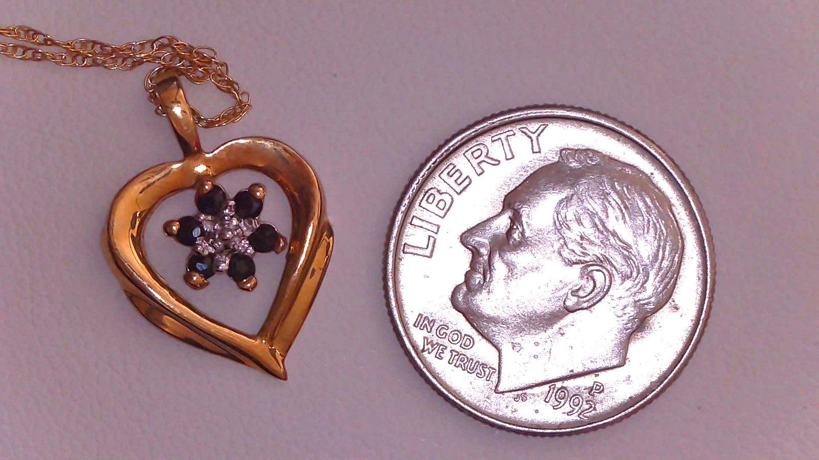 Vtg 10K Yellow Gold Genuine Blue Sapphires in an Open Heart Pendant Necklace