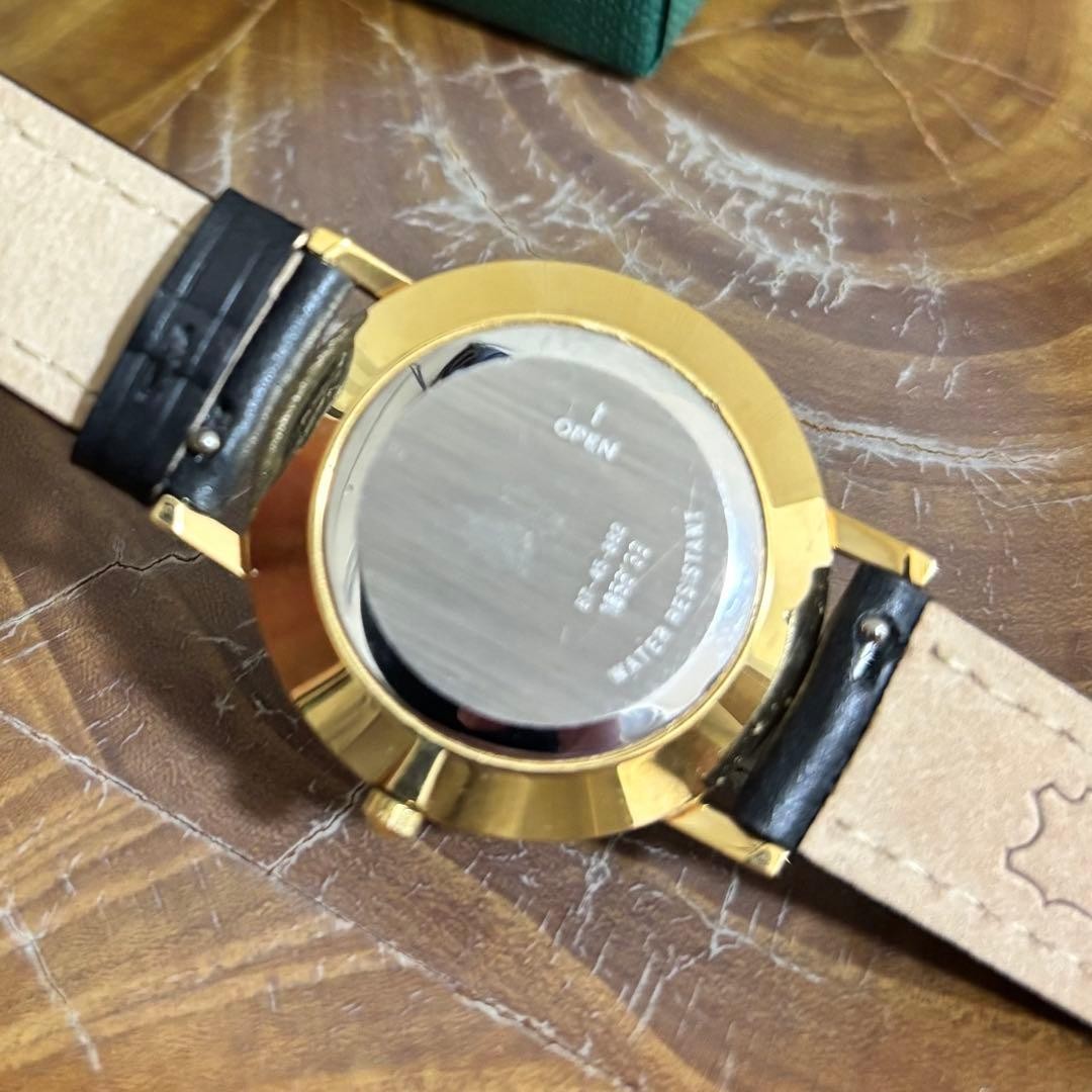 Movado Museum Ultra Slim Black & Gold Minimalist Watch Used