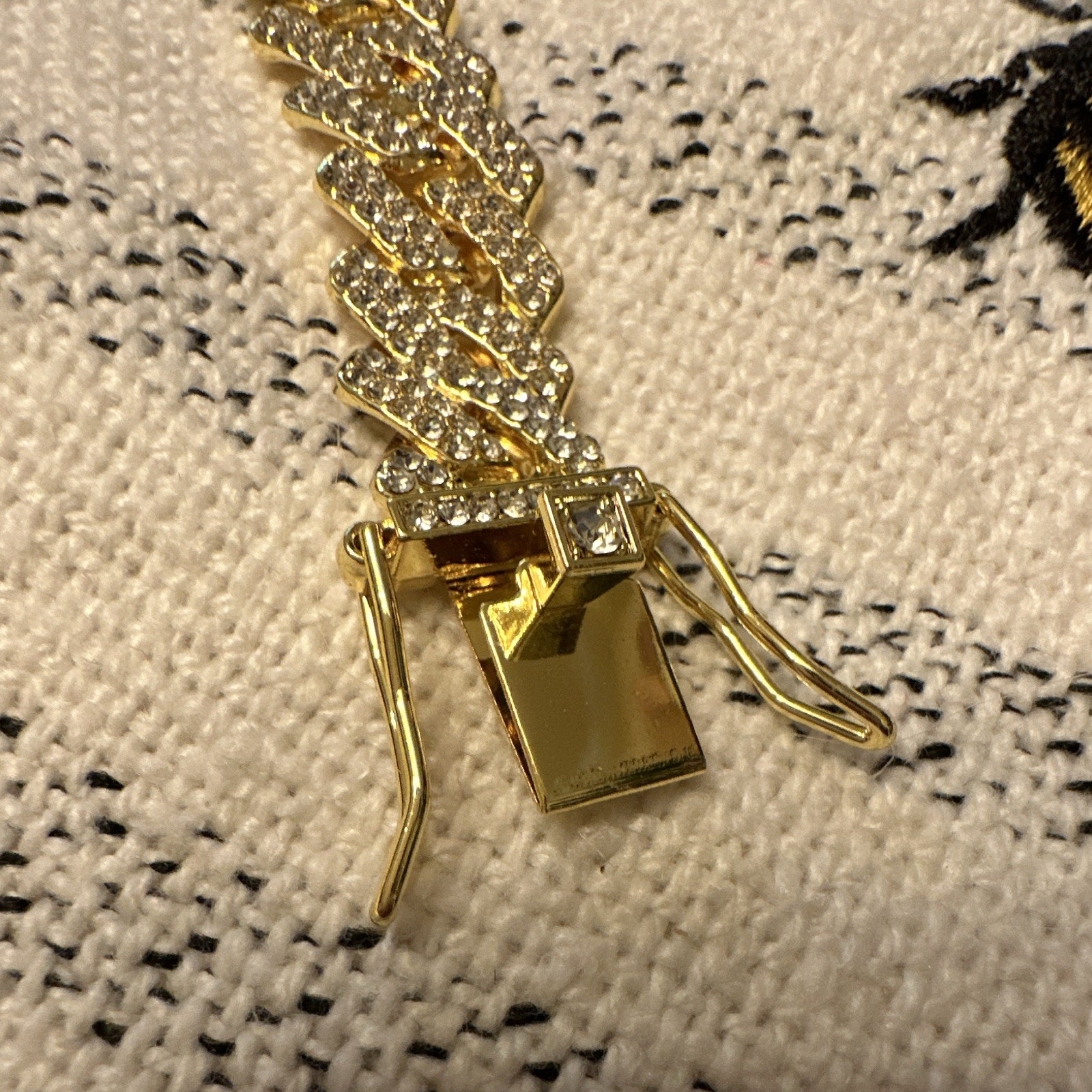 Gold Tone Cuban Link Chain Bracelet with Pavé Setting and Box Clasp Closure