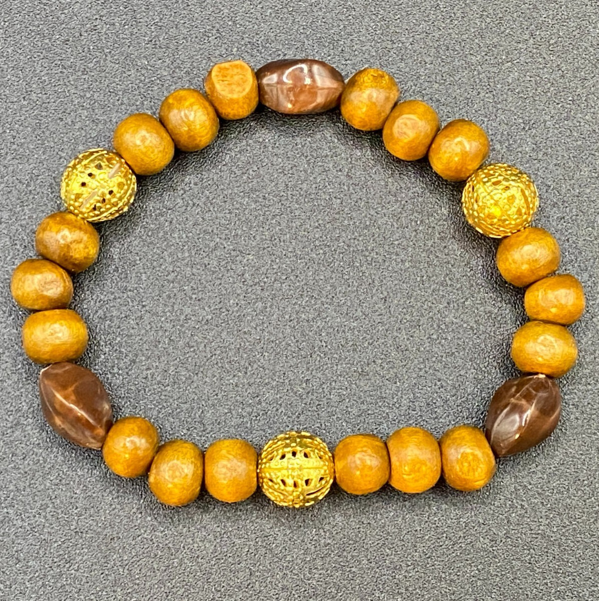 Wood Plastic and Gold Tone Metal Bead Stretch Bracelet