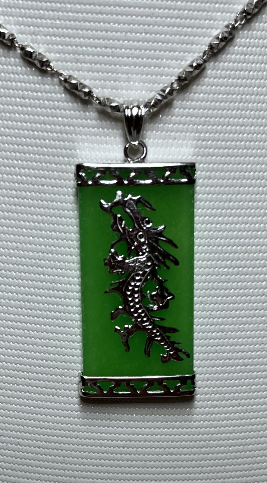 15×30 mm green jade pendant set in sterling silver (925) with dragon design