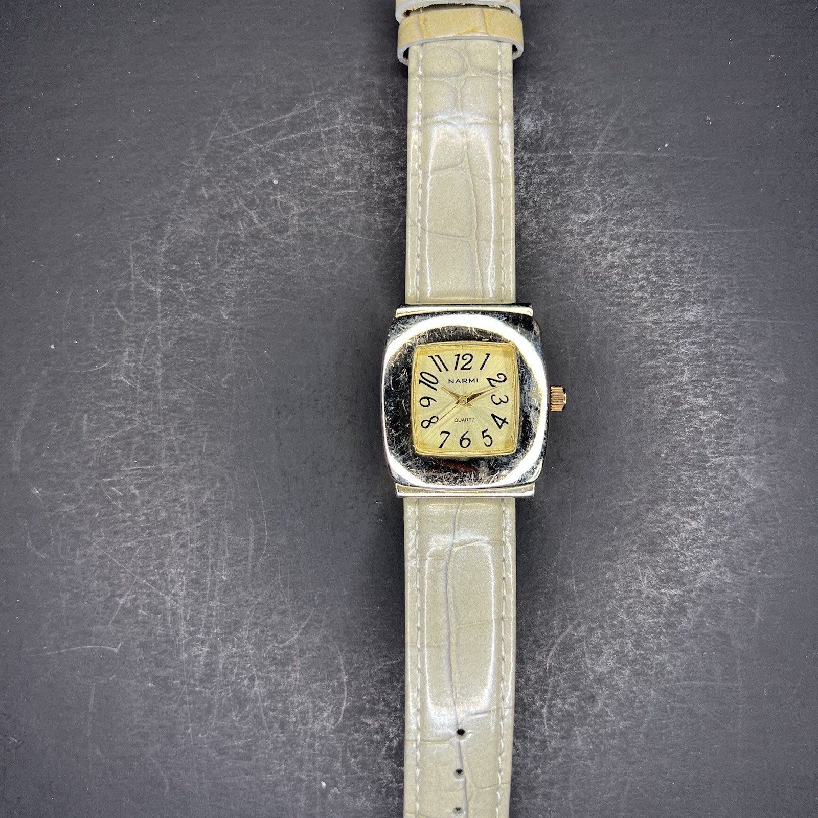 Narmi Women’s 28mm Square Silver Case Polished Bezel Gold Dial White Strap
