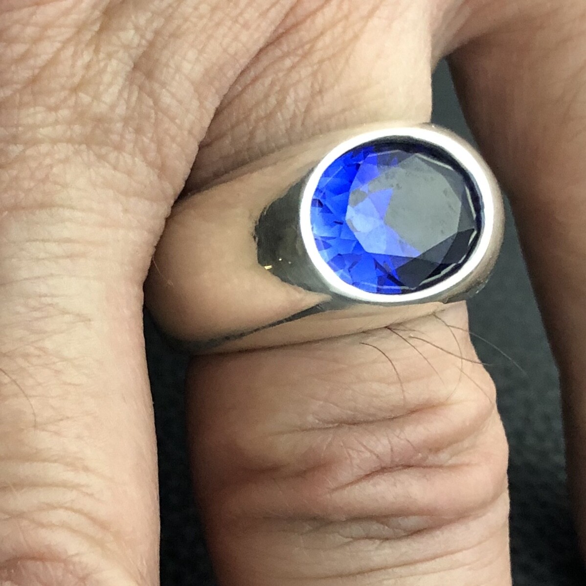 MJG STERLING SILVER MEN’S RING. 12 X 10mm FACETED LAB BLUE SAPPHIRE. SZ 9 3/4
