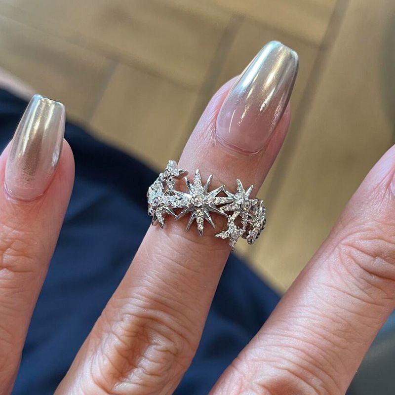 Women’s ring with full diamond eight-pointed star design, open design