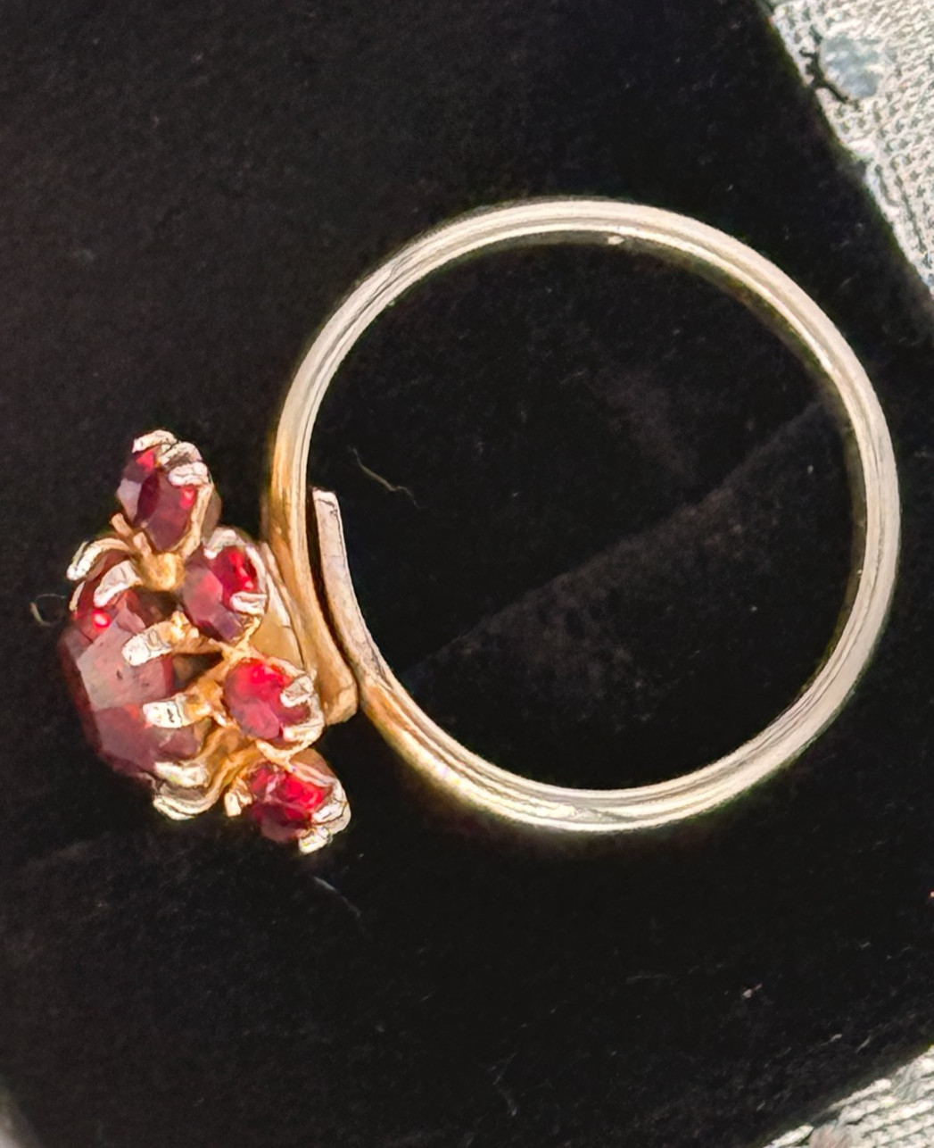 Deep Burgundy ring features a cluster of red rhinestones in a gold-tone setting.