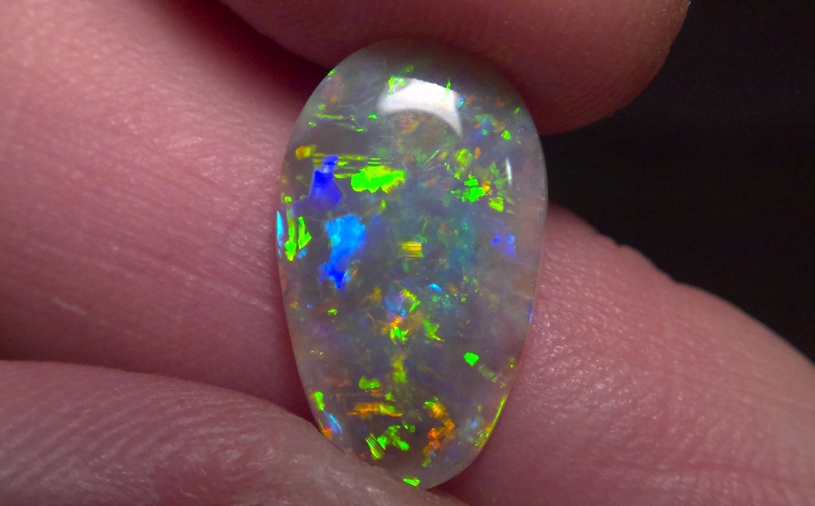 2.25cts Solid Lightning Ridge semi-black opal, stunning Rainbow fire + video