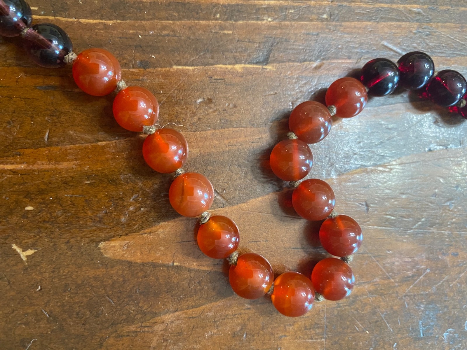 Vintage burgundy/purple/red ombre glass necklace with loop clasp and cording