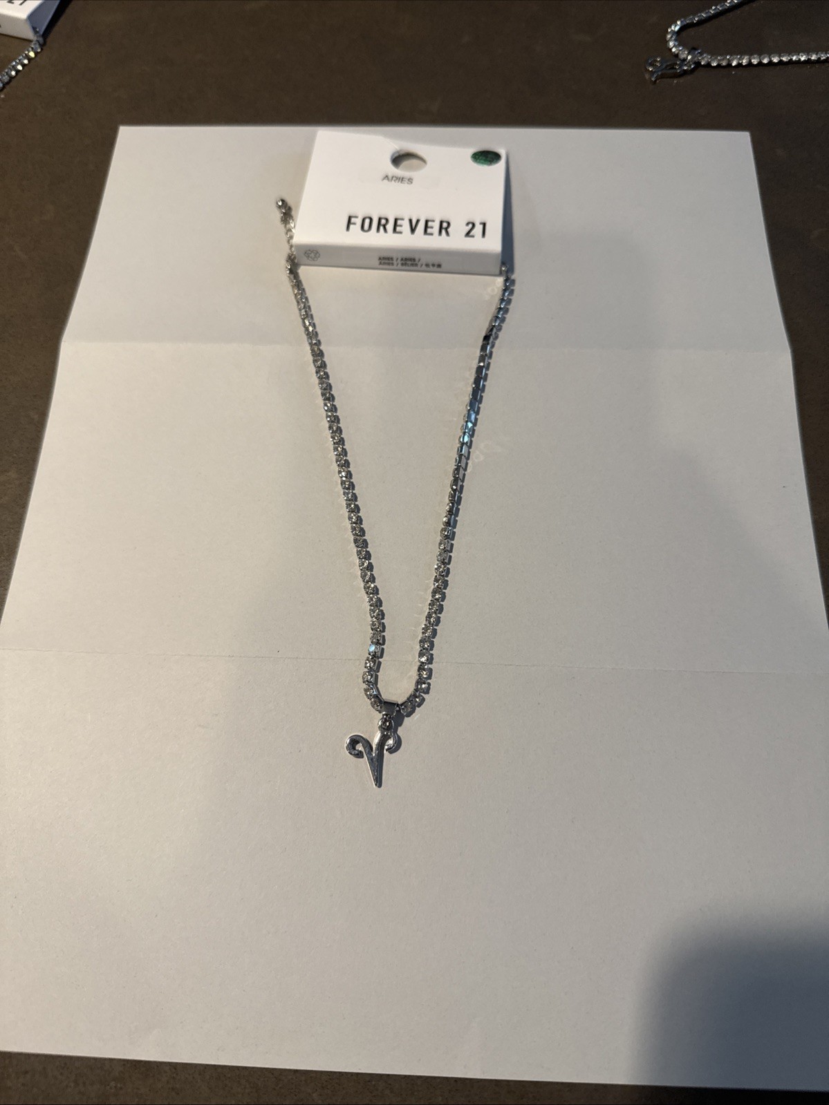 Zodiac sign necklace, silver .