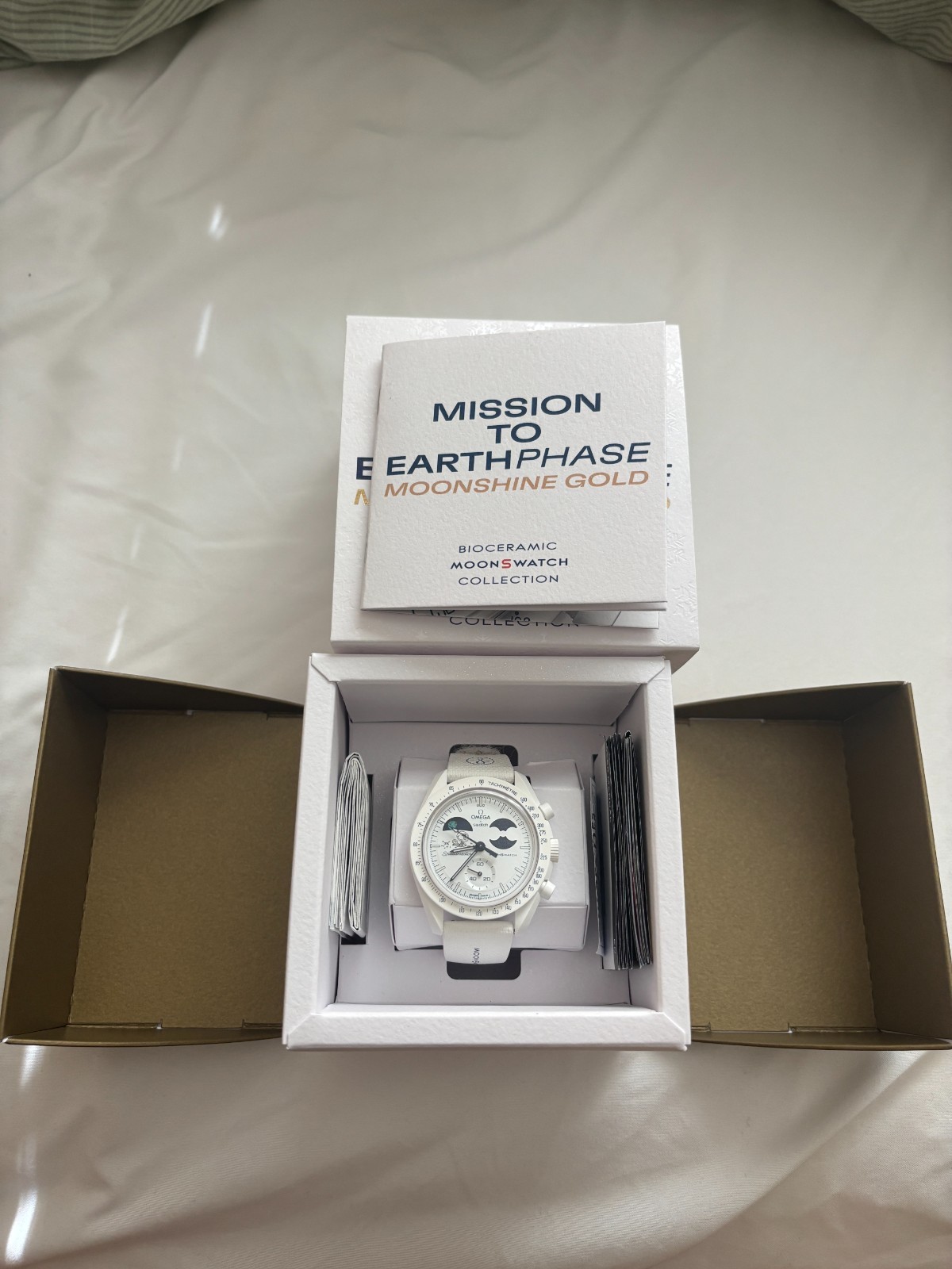 Omega x Swatch MISSION TO EARTHPHASE – MOONSHINE GOLD SO33W701L “Cold Moon”