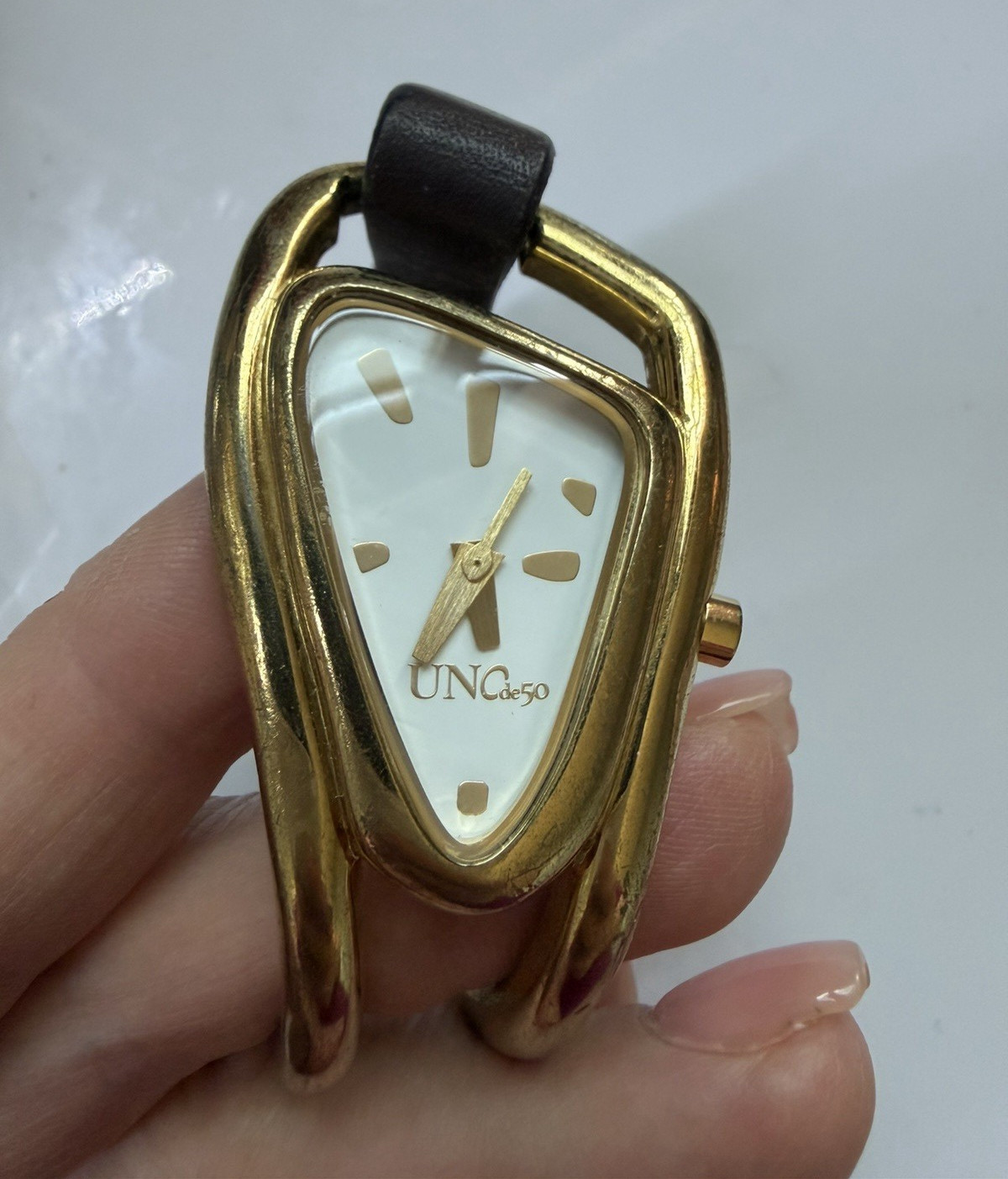 UNOde50 Women’s Quartz Analog Watch Asymmetrical Gold Case White Dial Brown
