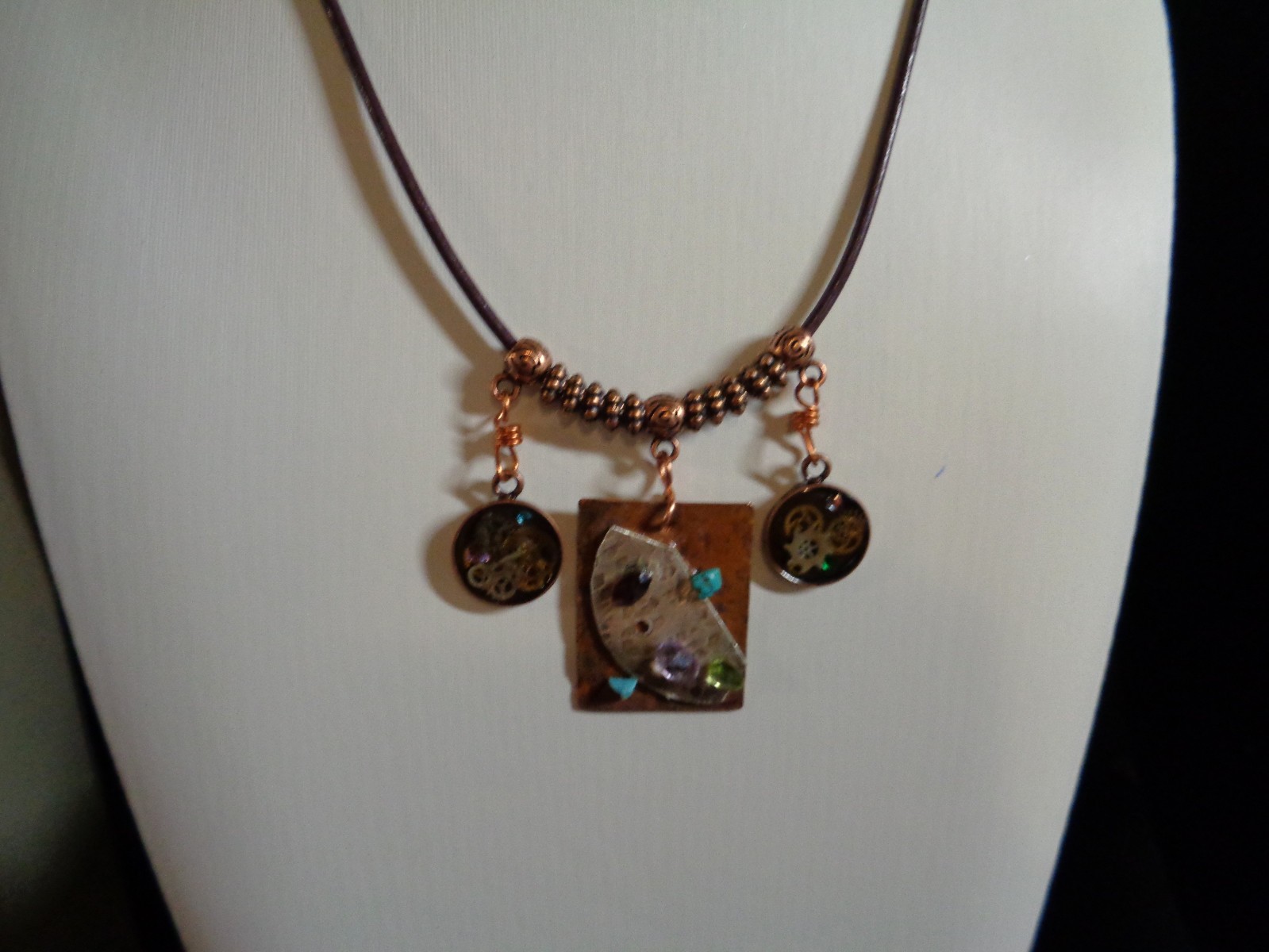 Artisan crafted,eclectic,18” necklace. Central handcrafted copper collage pendan