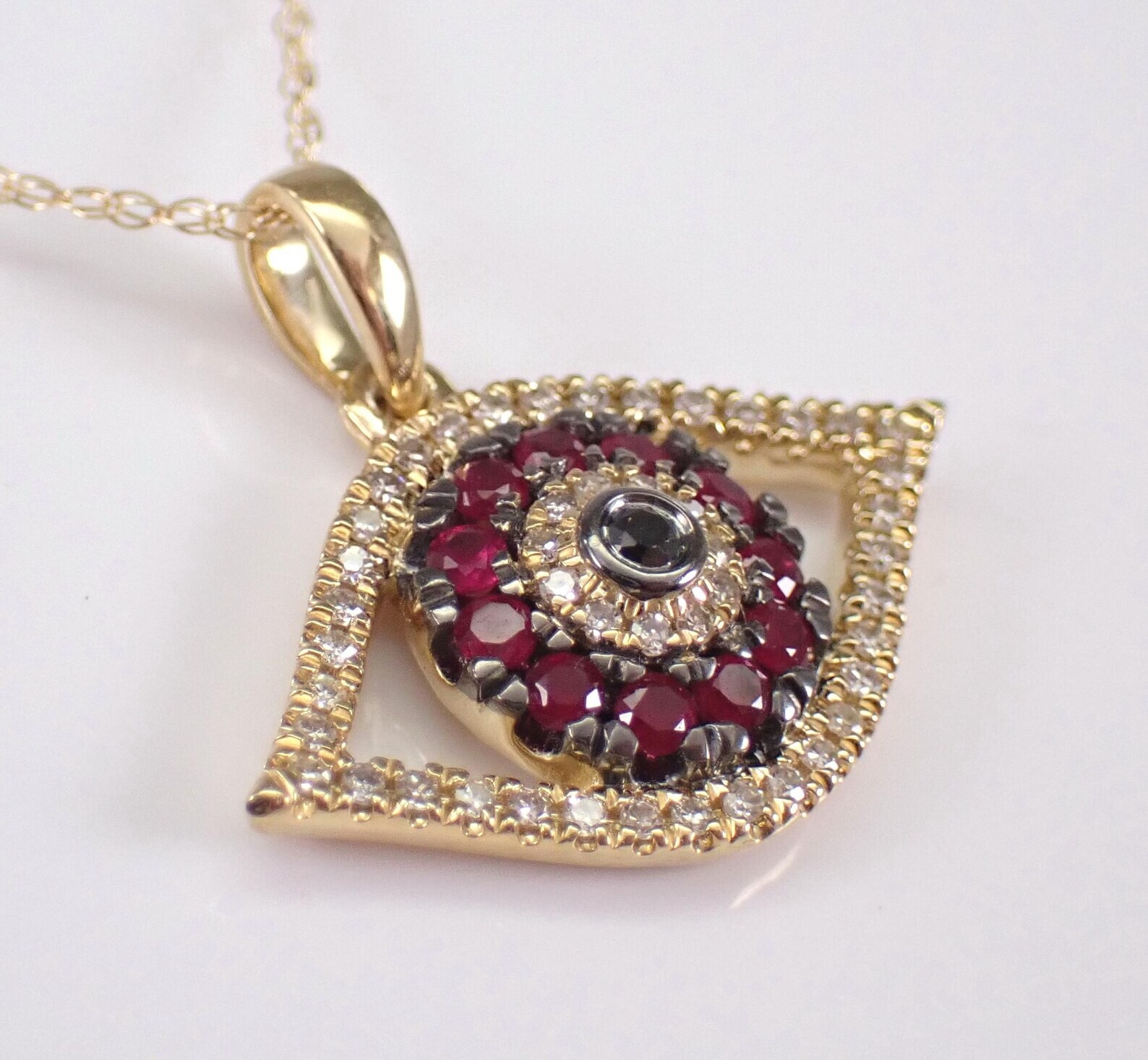0.40Ct Round Cut Lab-Created Red Ruby Evil Eye Pendant 14K Yellow Gold Plated
