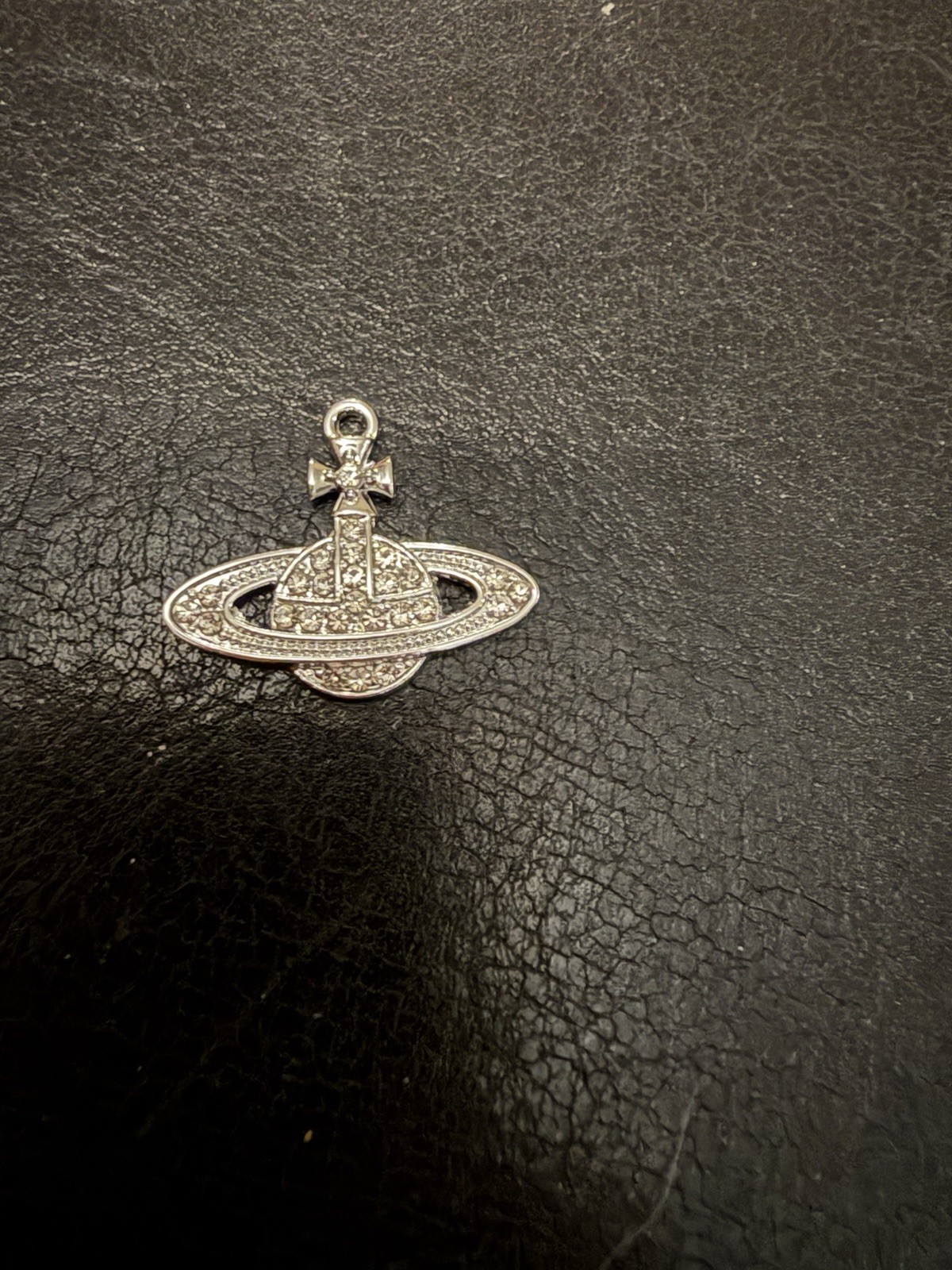 Orb pendant With a silver-tone finish with clear, rhinestones