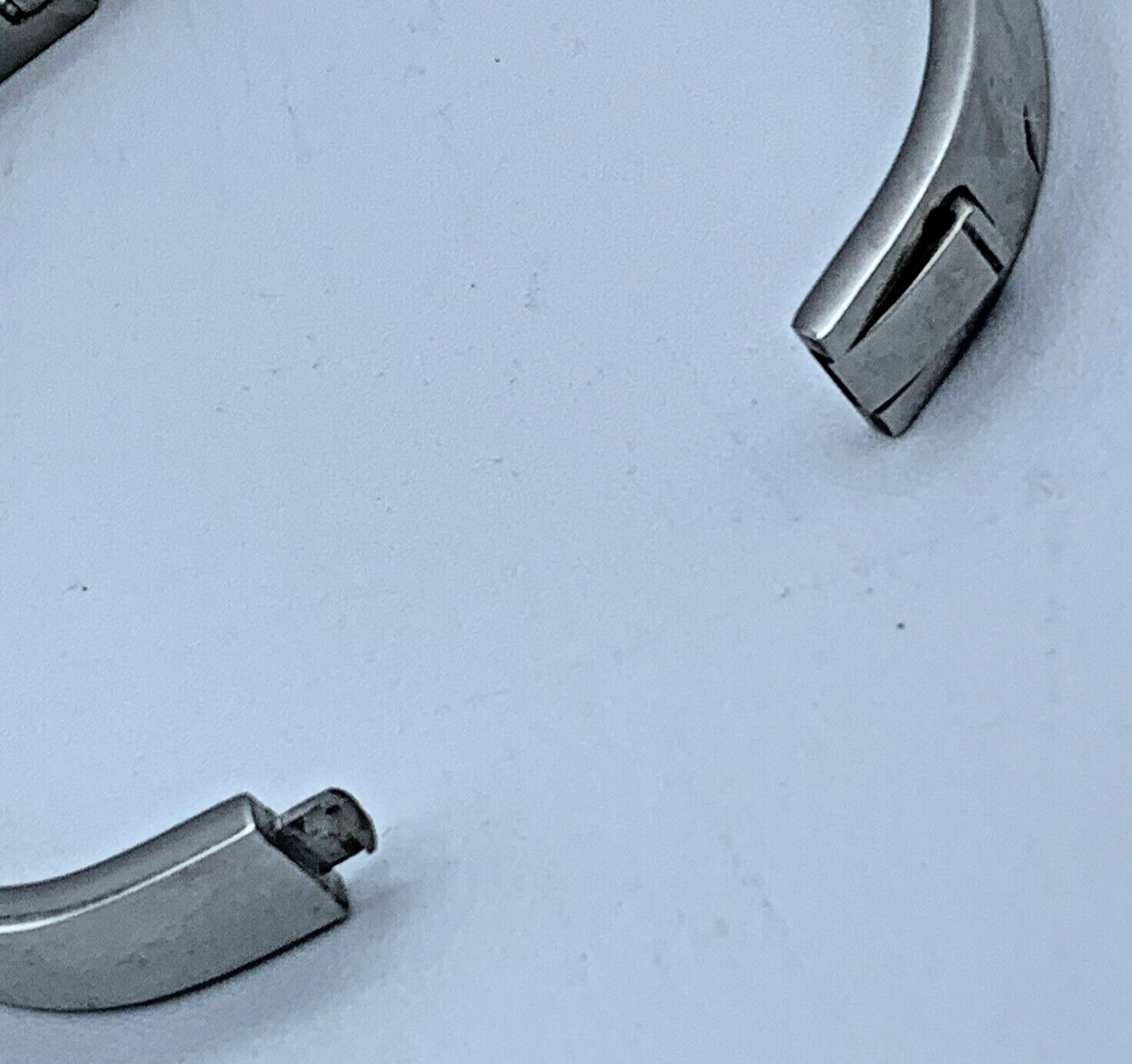 Rustic Cuff 7.25 in Cindy Silver Tone Hinged Bangle Bracelet w/ Bow Accent B4-23