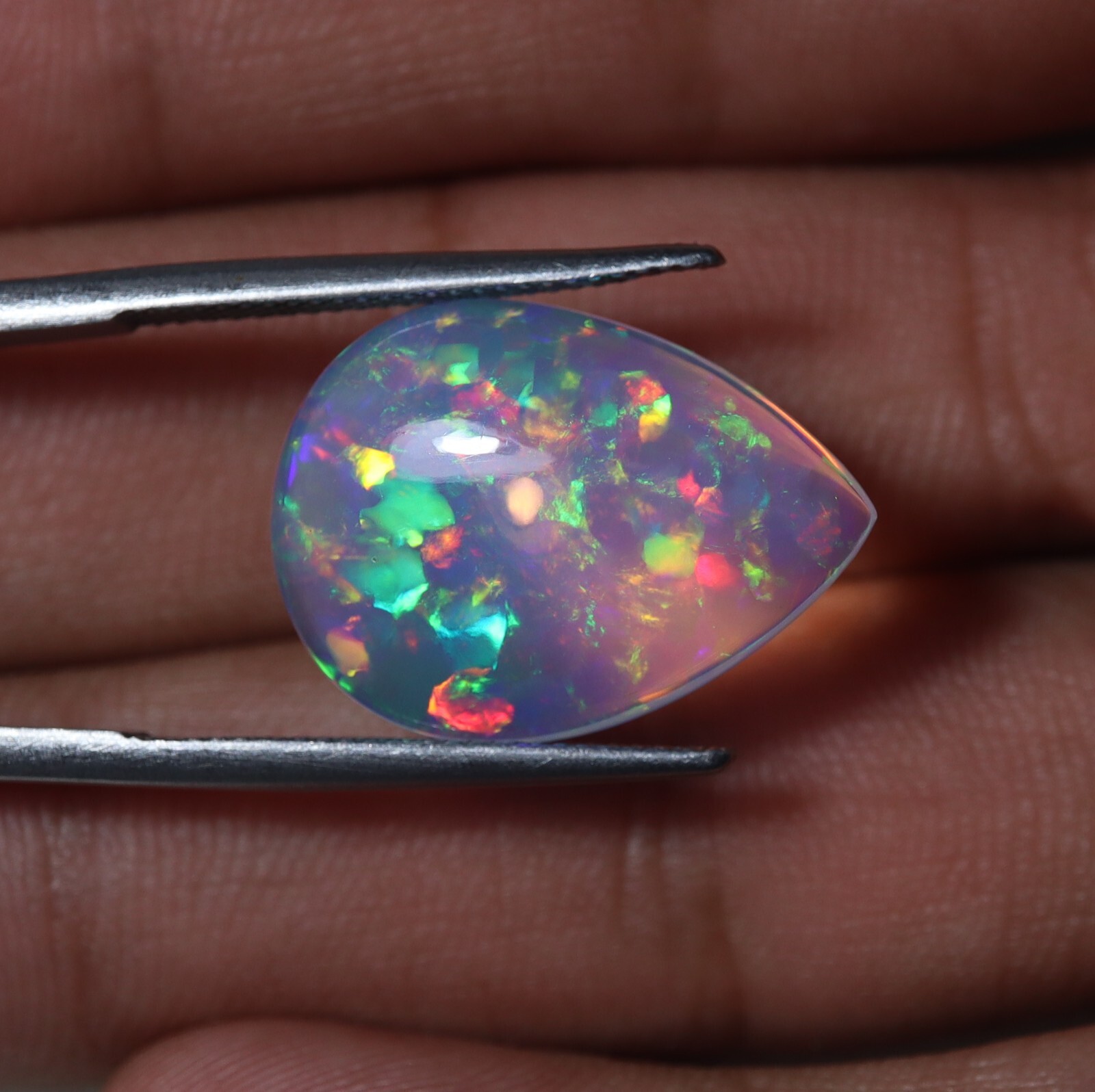 9 Carat 21.9×15.9 MM Natural AAAA Rainbow Fire Ethiopian Welo Opal Pear Shape