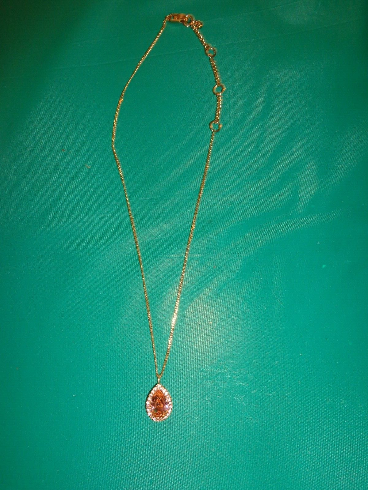 Givenchy Goldtone Amber Rhinestone Pendant Necklace Pendant is Not Signed
