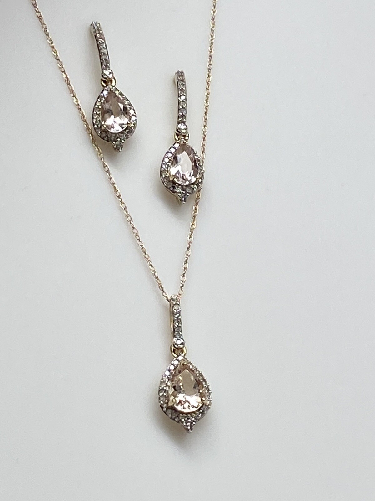 10K Yellow Gold Pear Shape Morganite and 0.11ct twt. Diamond Pendant with Chain