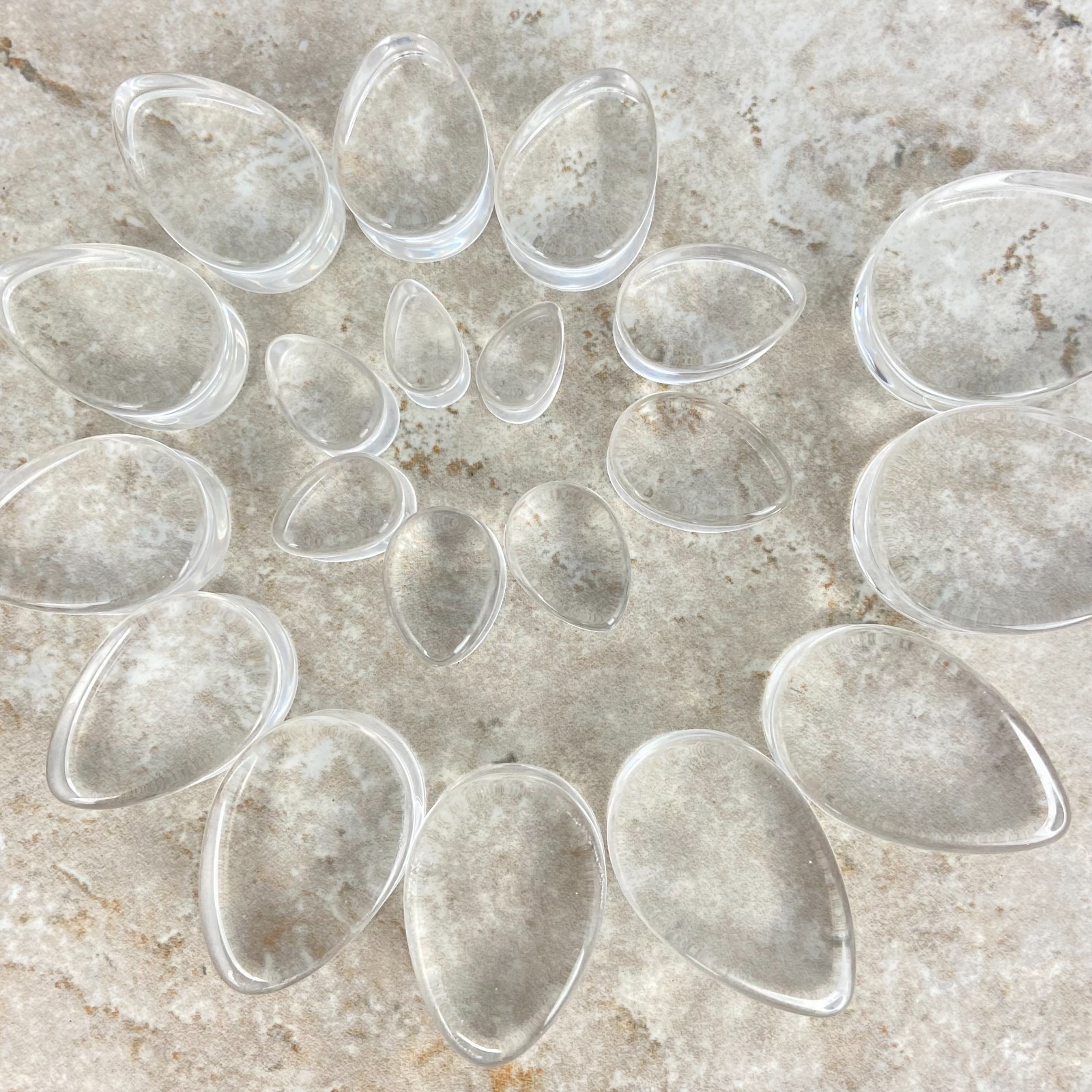 Pair of Clear Glass Double Flare Teardrop Glass Plugs (PG-545) gauges